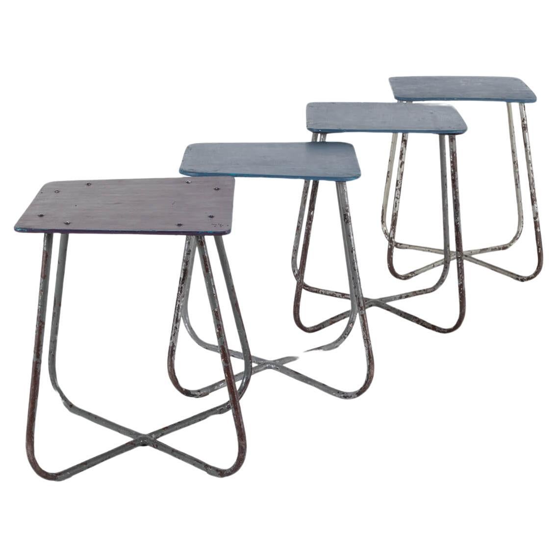 Four Industrial Stools For Sale