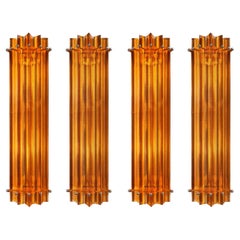 Quattro lampade da parete italiane in ambra, stile Venini Murano, anni
90