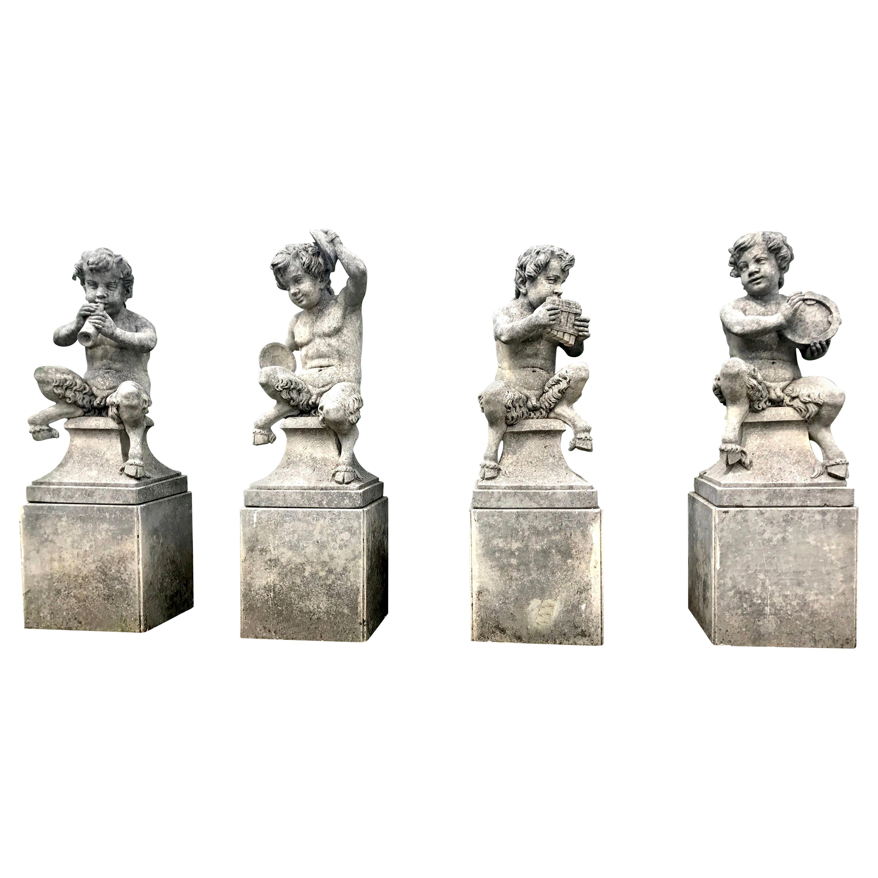 Four Italian Fauns Stone Garden Statues Representing Musicians For Sale