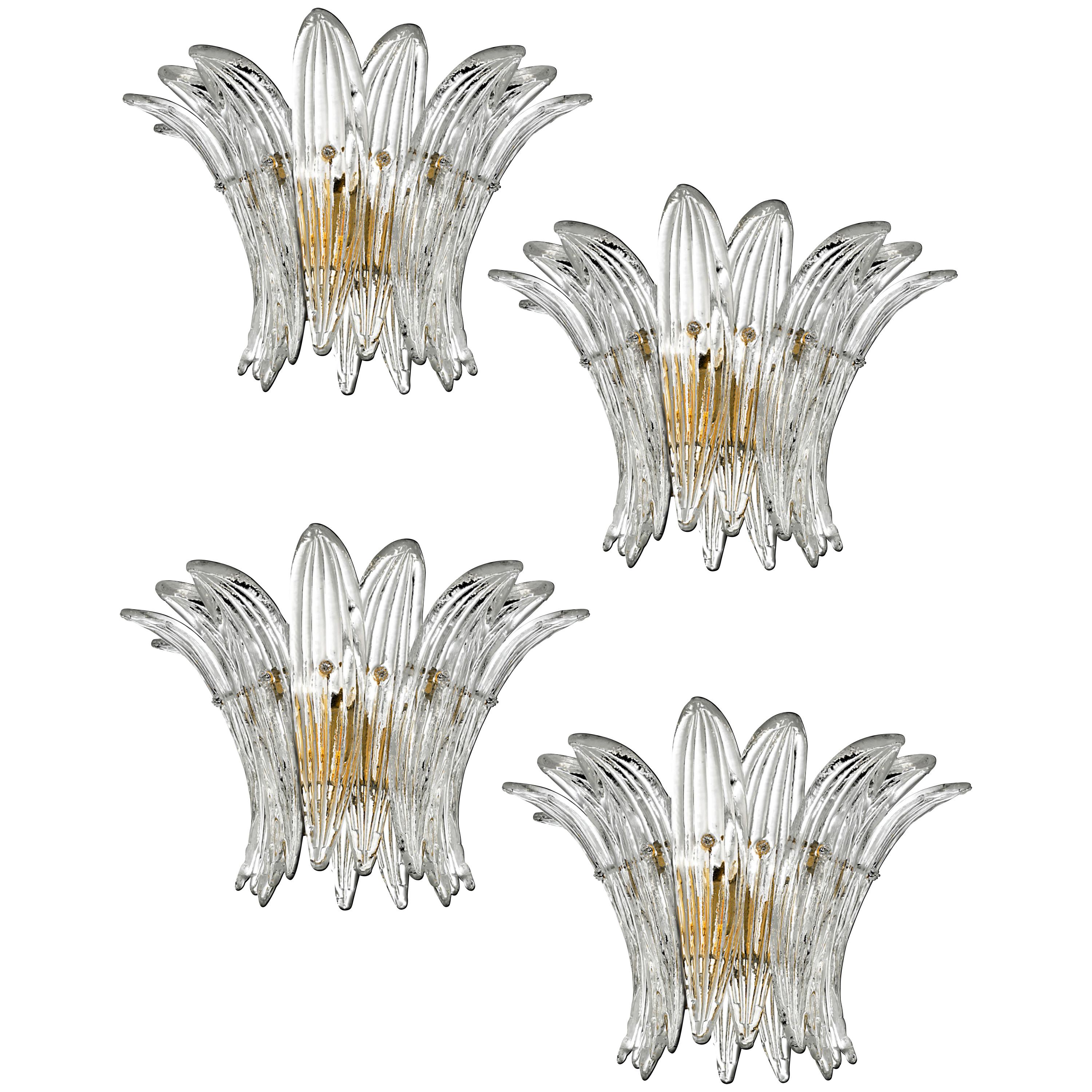 Set four sconces in the style of Barovier & Toso.
Each sconce is composed of 9 palmettes in pure Murano glass arranged horizontally.