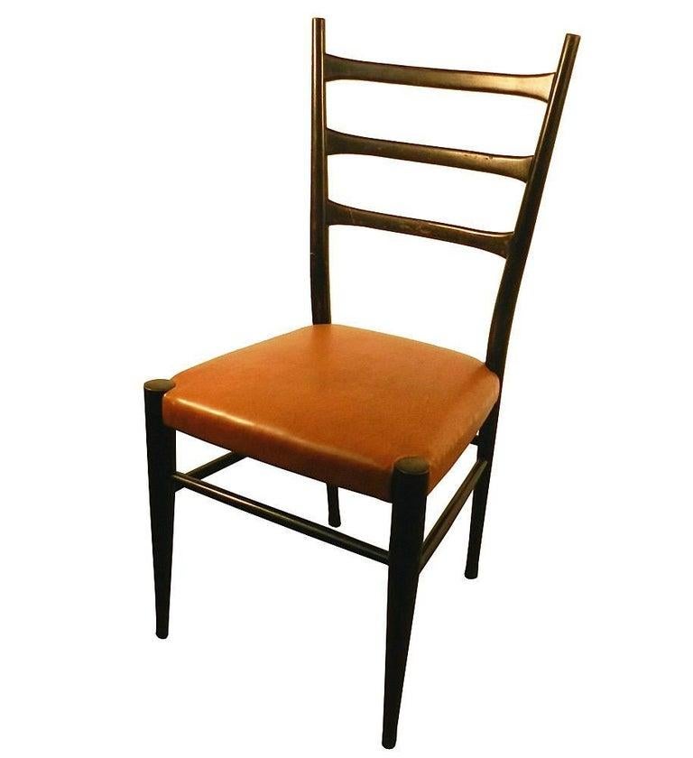 Cuatro sillas de estilo italiano, hacia 1950-1960 Ennegrecido en venta