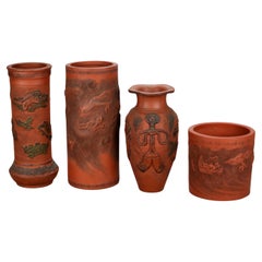 Four Japanese Embossed Terra Cotta Vases C1930