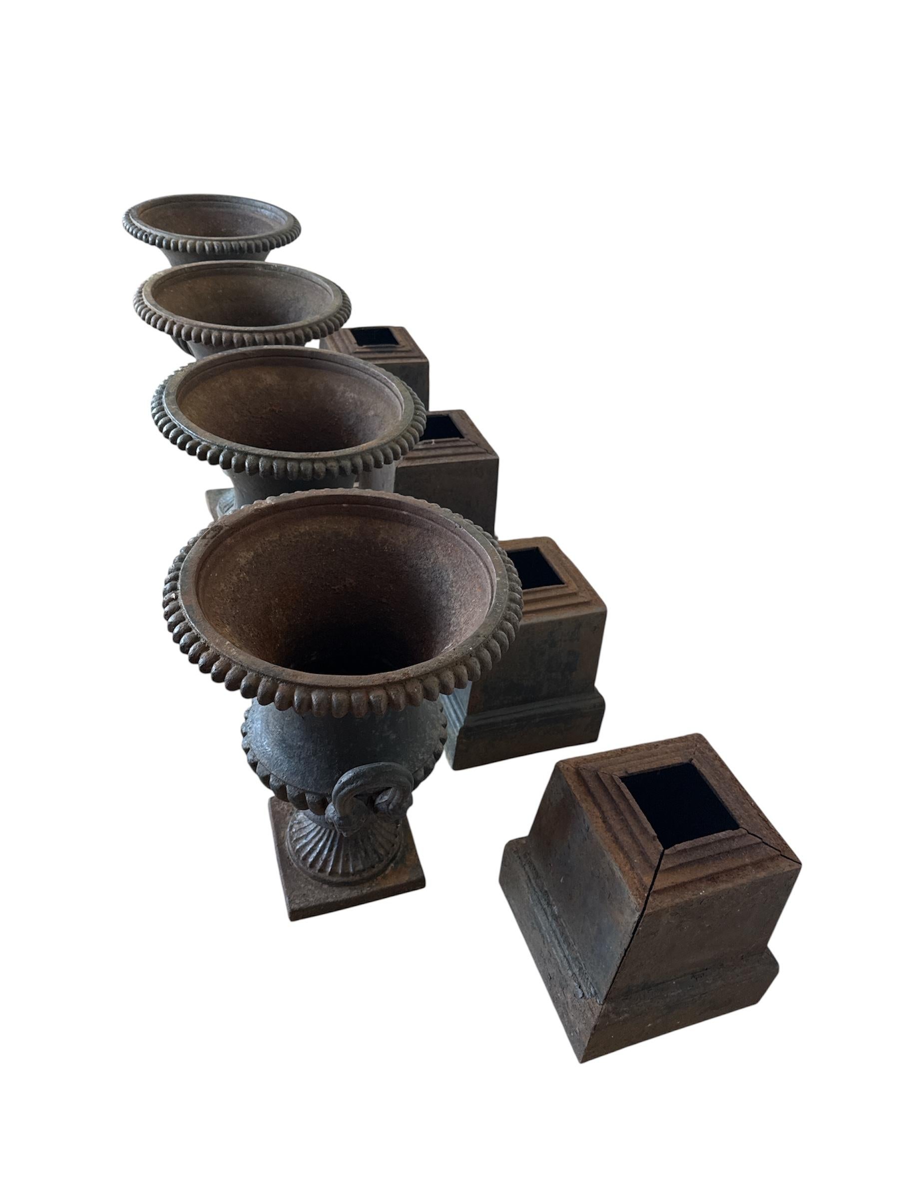 Four Large Capagna Form Black Cast Iron Planters Urns with bases For Sale 1