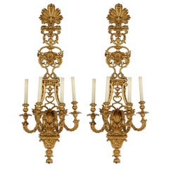Vier große vergoldete Bronzewandleuchter im Louis XV-Stil