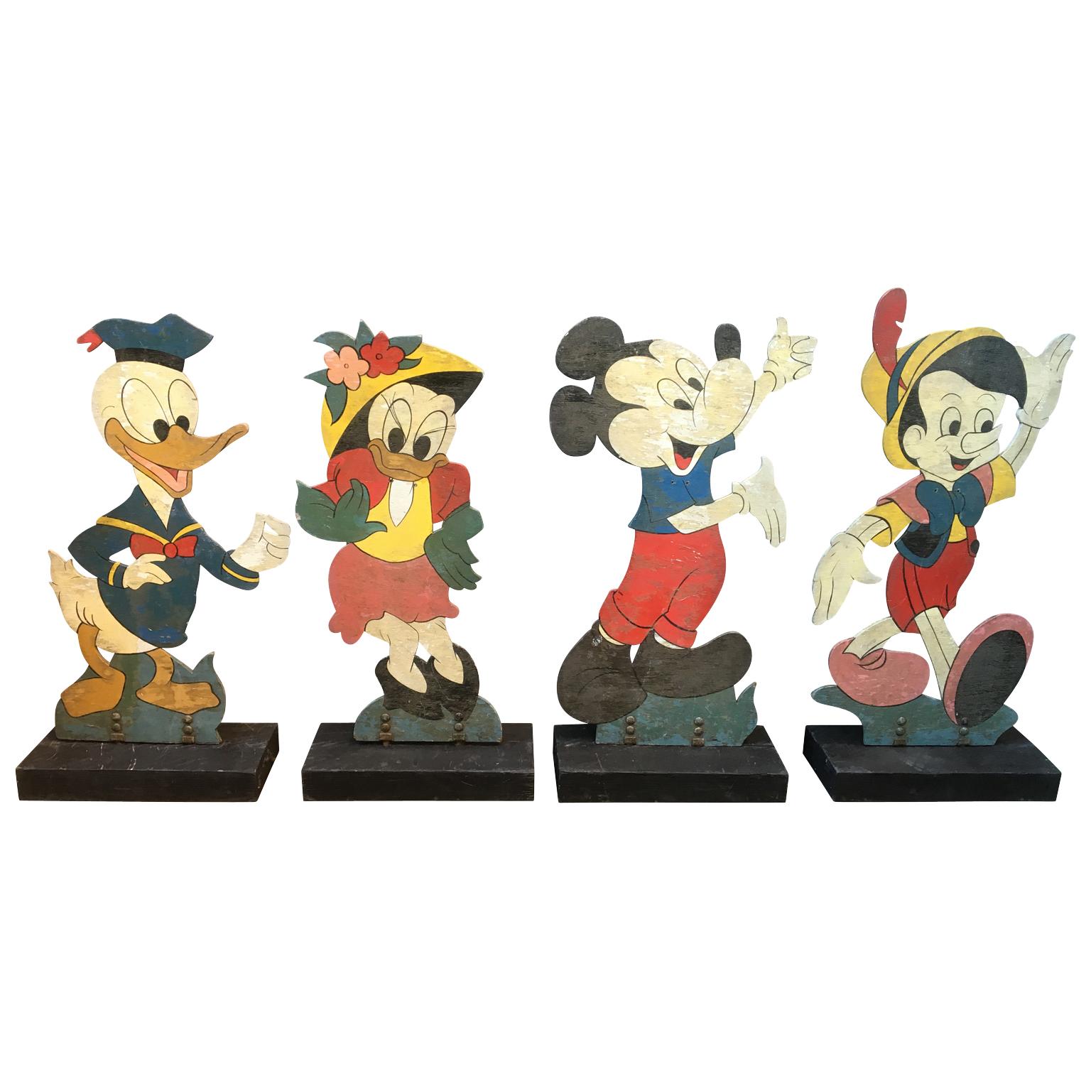 Four Large Mid-Century Disney Figures Donald, Daisy, Micky Mouse And Pinocchio