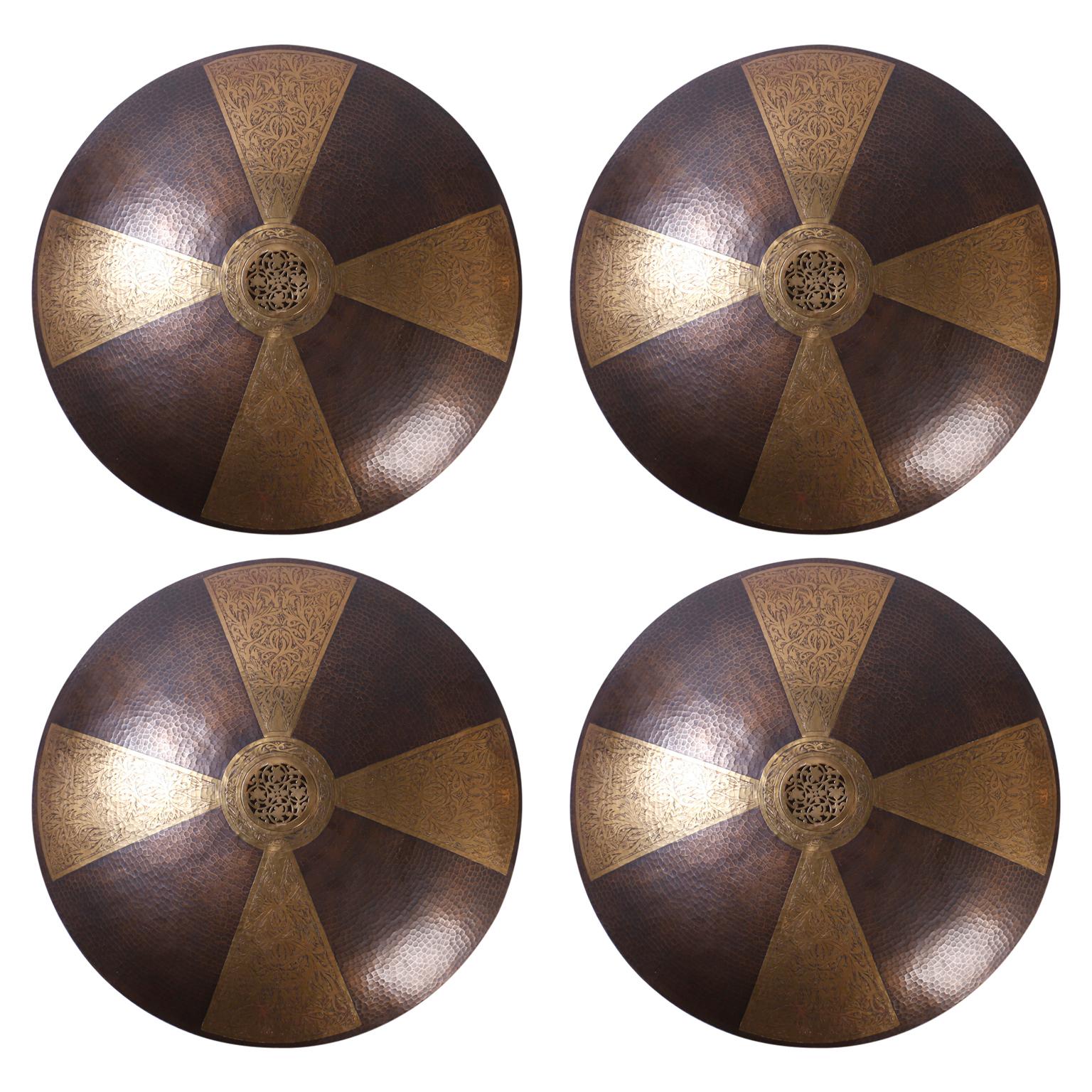 Four Large Moroccan Brass and Copper Shield Shaped Wall Sconces, Priced Per Pair