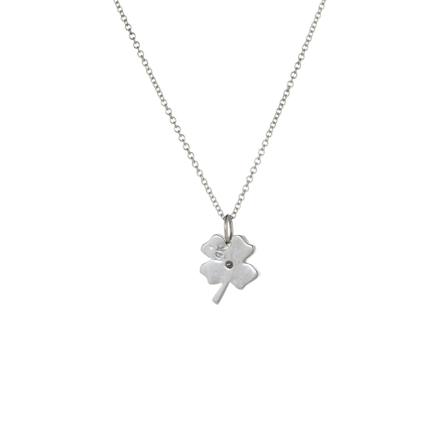 Stylish and finely detailed diamond four leaf clover necklace crafted in 14 karat white gold.  

Diamonds total an estimated 0.10 carats (estimated at H-I color and SI2-I2 clarity). 

The four leaf clover is petite in scale and ideal worn alone or