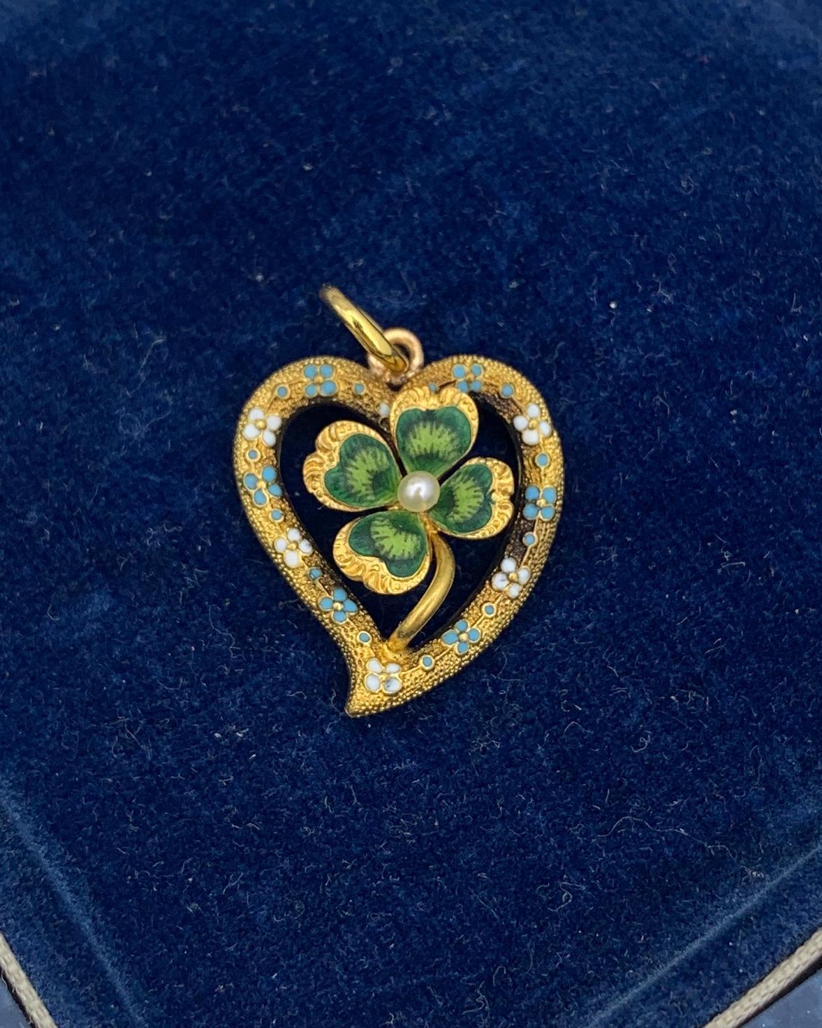 THIS IS A WONDERFUL A VICTORIAN - ART NOUVEAU PENDANT IN THE FORM OF A FLOWER ADORNED HEART WITH A LUCKY FOUR LEAF CLOVER IN THE CENTER WITH A CENTRAL PEARL AND THE MOST SPECTACULAR GREEN, ROBIN'S EGG BLUE AND CREAM COLORED DETAILED ENAMEL OF THE