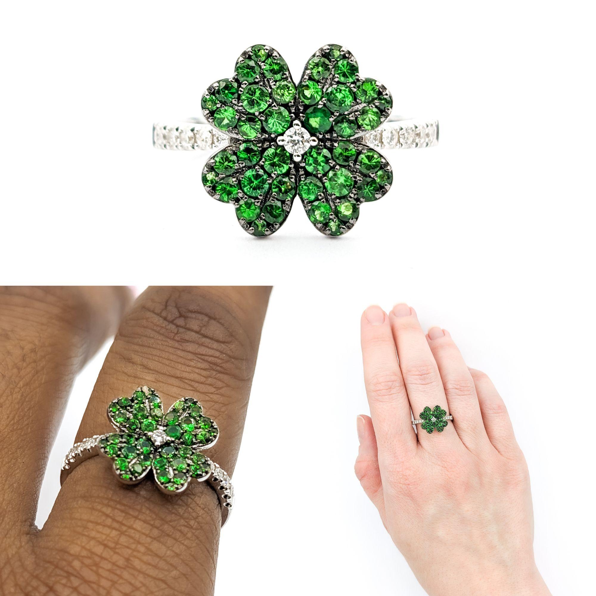 Four Leaf Clover Shamrock Ring with Tsavorite Garnets & Diamonds in 14kt White Gold

Discover the enchanting beauty of this 14kw White Gold Ring, adorned with a delightful 4-Leaf Clover design embellished with .16ctw of sparkling Diamonds. The