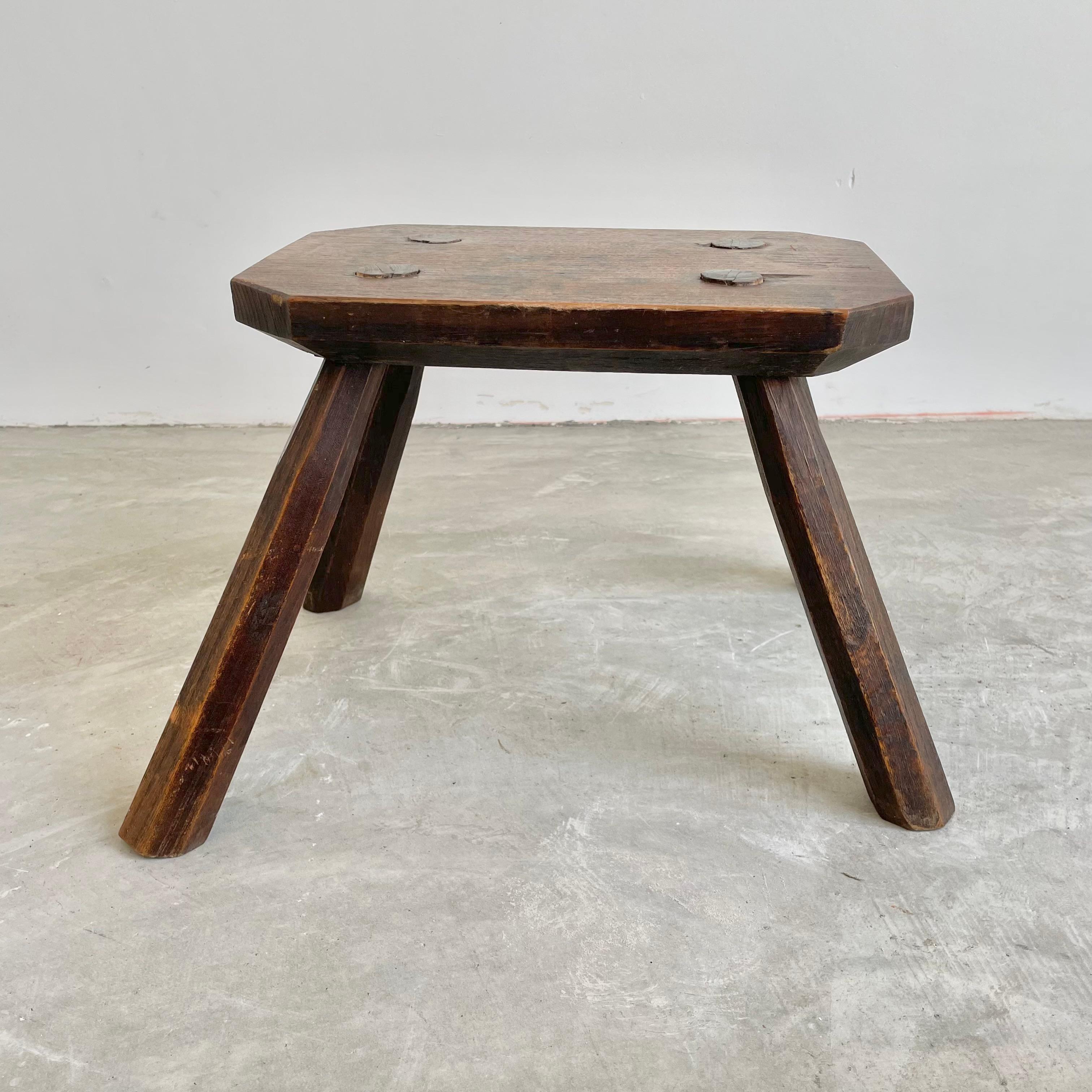 four legged wooden stool