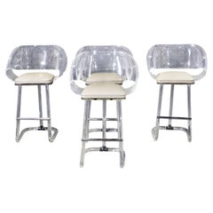 Quatre tabourets de comptoir Leon Frost