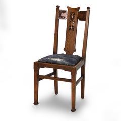 Four Liberty & Co English Arts & Crafts Oak Chairs with Carved Floral Back Slats