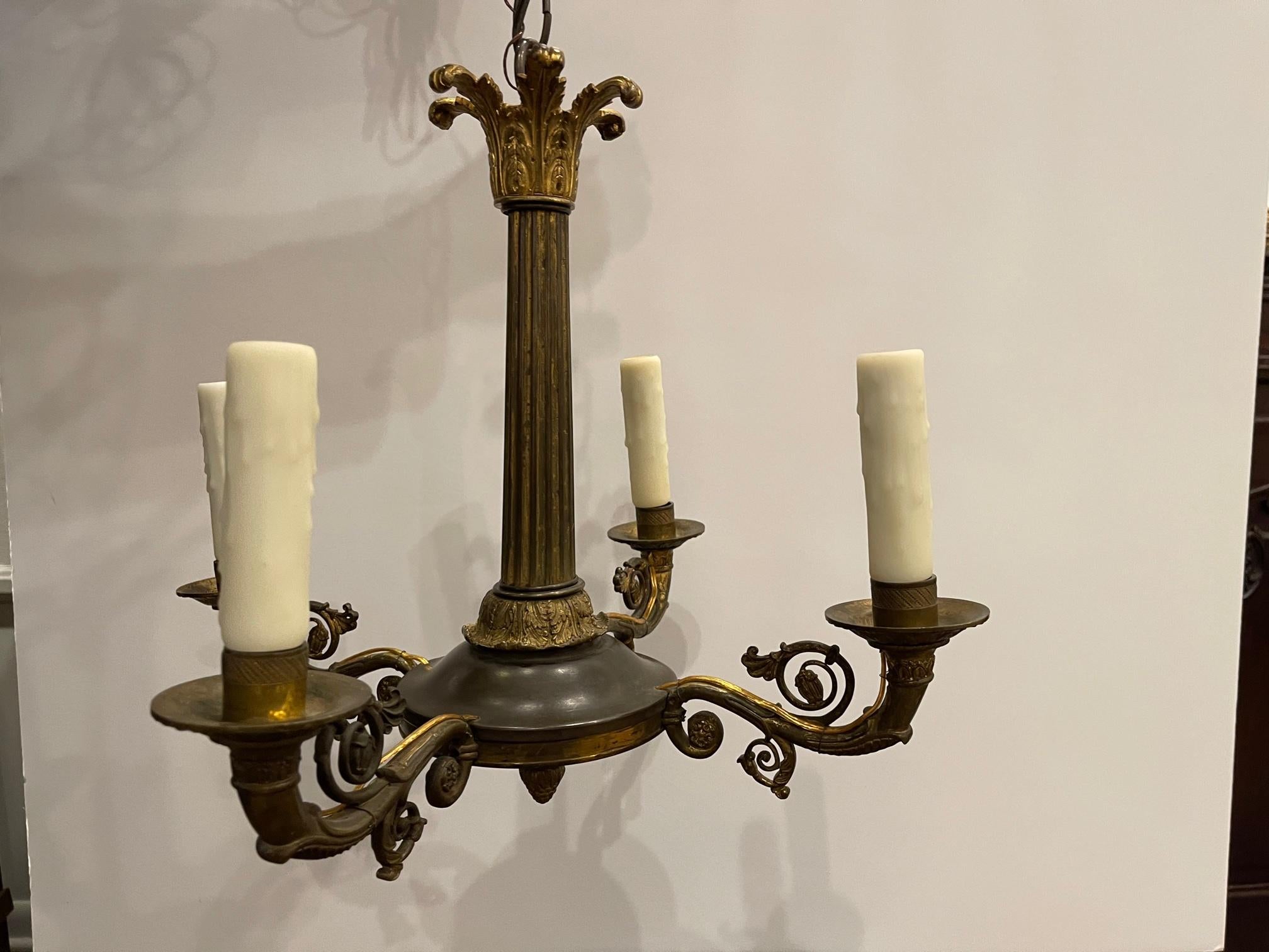 Four-light cast bronze empire style chandelier or light fixture, late 19th century.