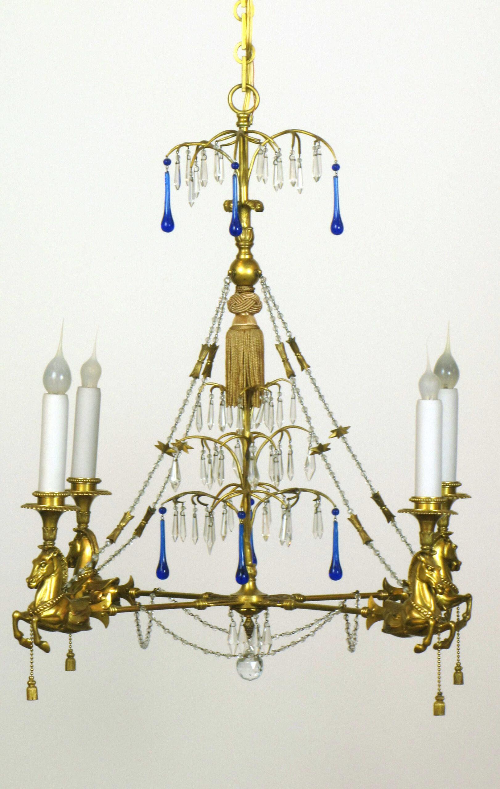 Four light French gasolier, Napoleon III style. Exceptional brass castings of horses, original beaded crystal chains. electrified. C. 1900 In the style of Percier and Fontaine. 

Dimensions: 
Height: 30
