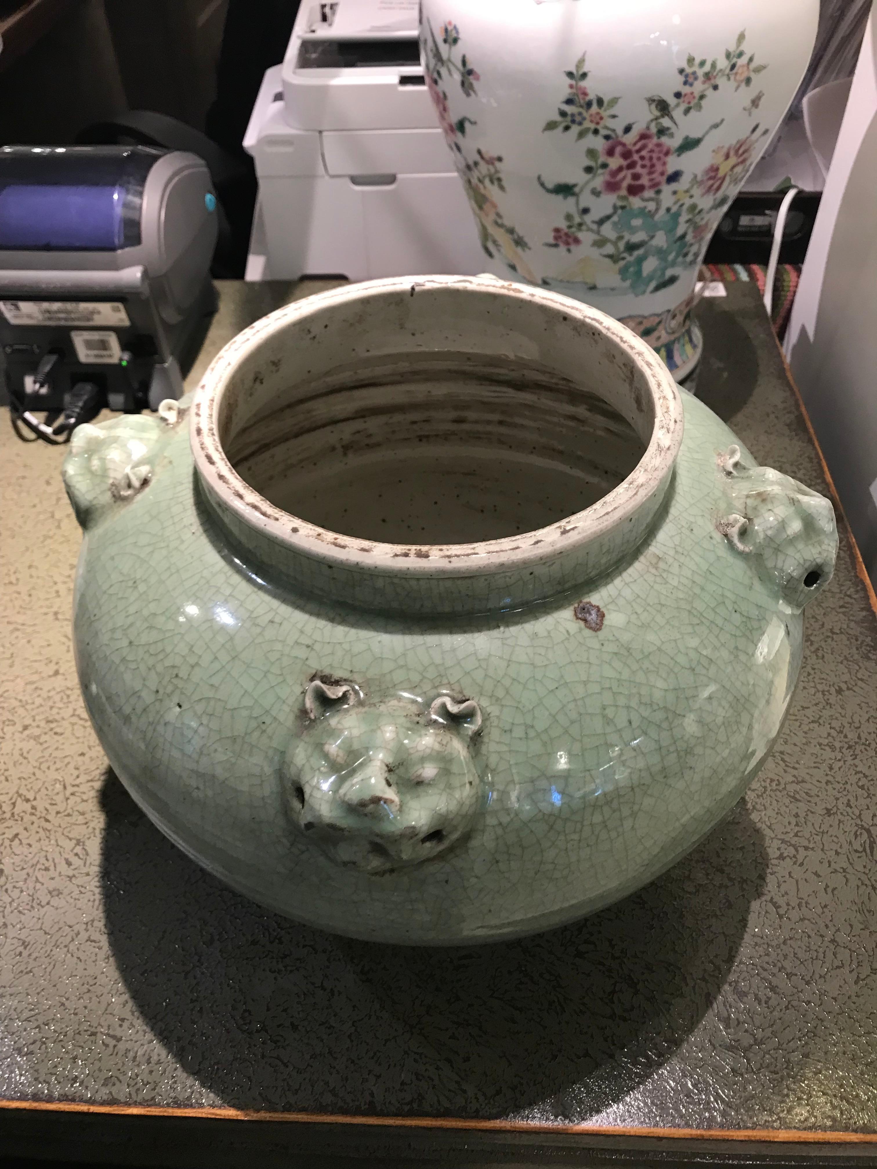 Four lion head handle jar celadon crackle

The special antique process makes it looks like a piece of art from a museum. 
High fire porcelain, 100% hand shaped, hand painted. Distress, chips and other imperfections create great characters of this