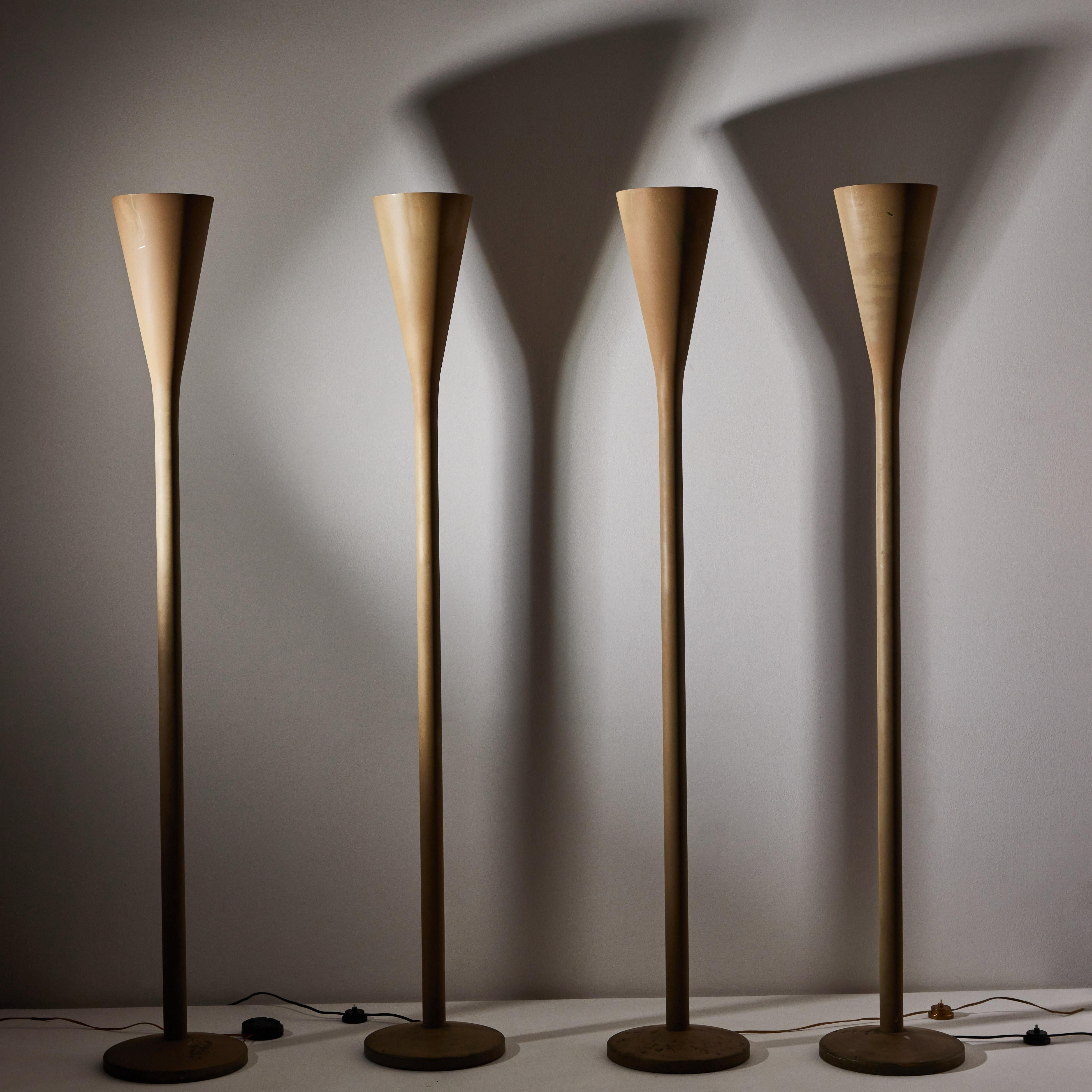 Three luminator floor lamps by Pietro Chiesa for Fontana Arte. Designed and manufactured in Italy, circa 1930's. Painted aluminum, original European cord.
Lightbulbs not included. Suggested Lamping: 1 Qty 120V E27 75w frosted bulb. Literature: Domus