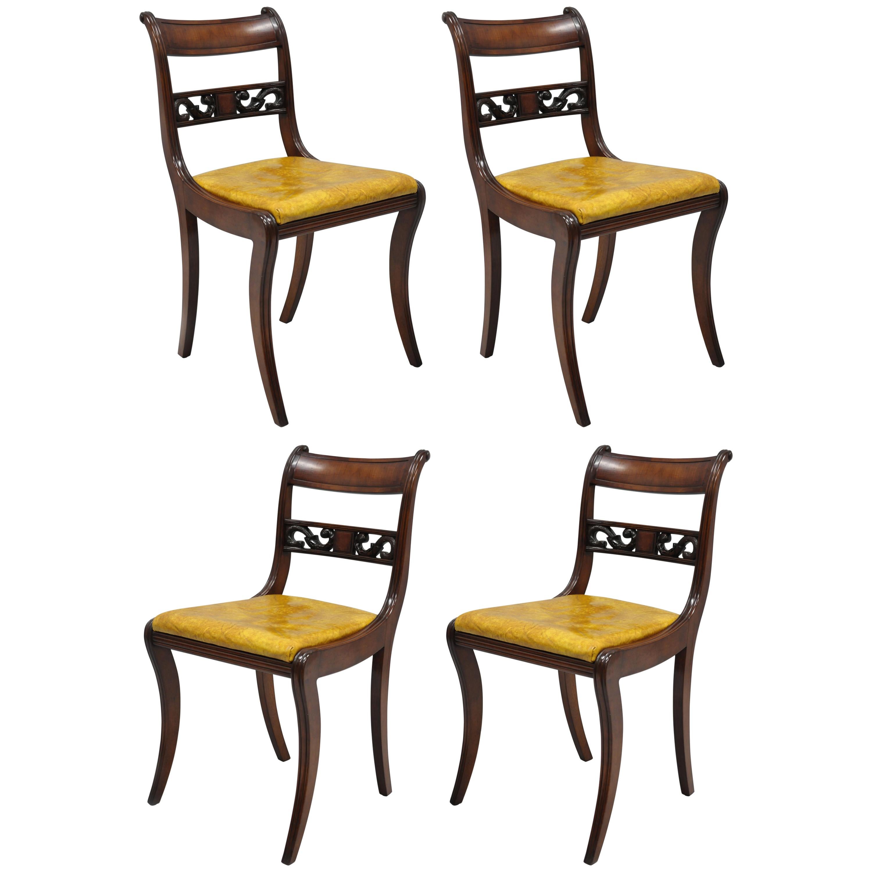 Four Mahogany Carved Plume & Acanthus Regency Style Saber Leg Dining Side Chairs