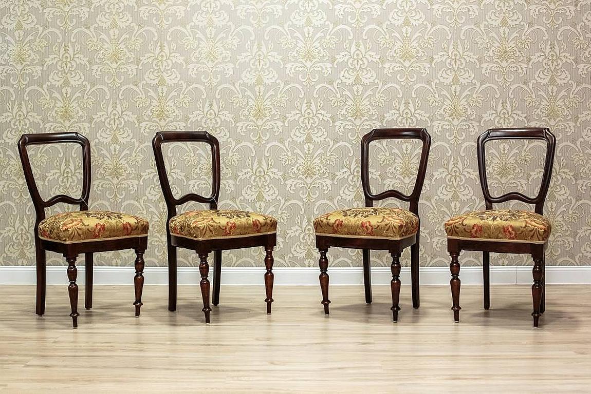 1930s Vintage Mahogany Chairs - Set of 4

Extremely elegant chairs originating from Northern Europe, made of mahogany wood. The restrained in decoration form of the chairs is enlivened by turned front legs. The seats are spring-loaded, upholstered