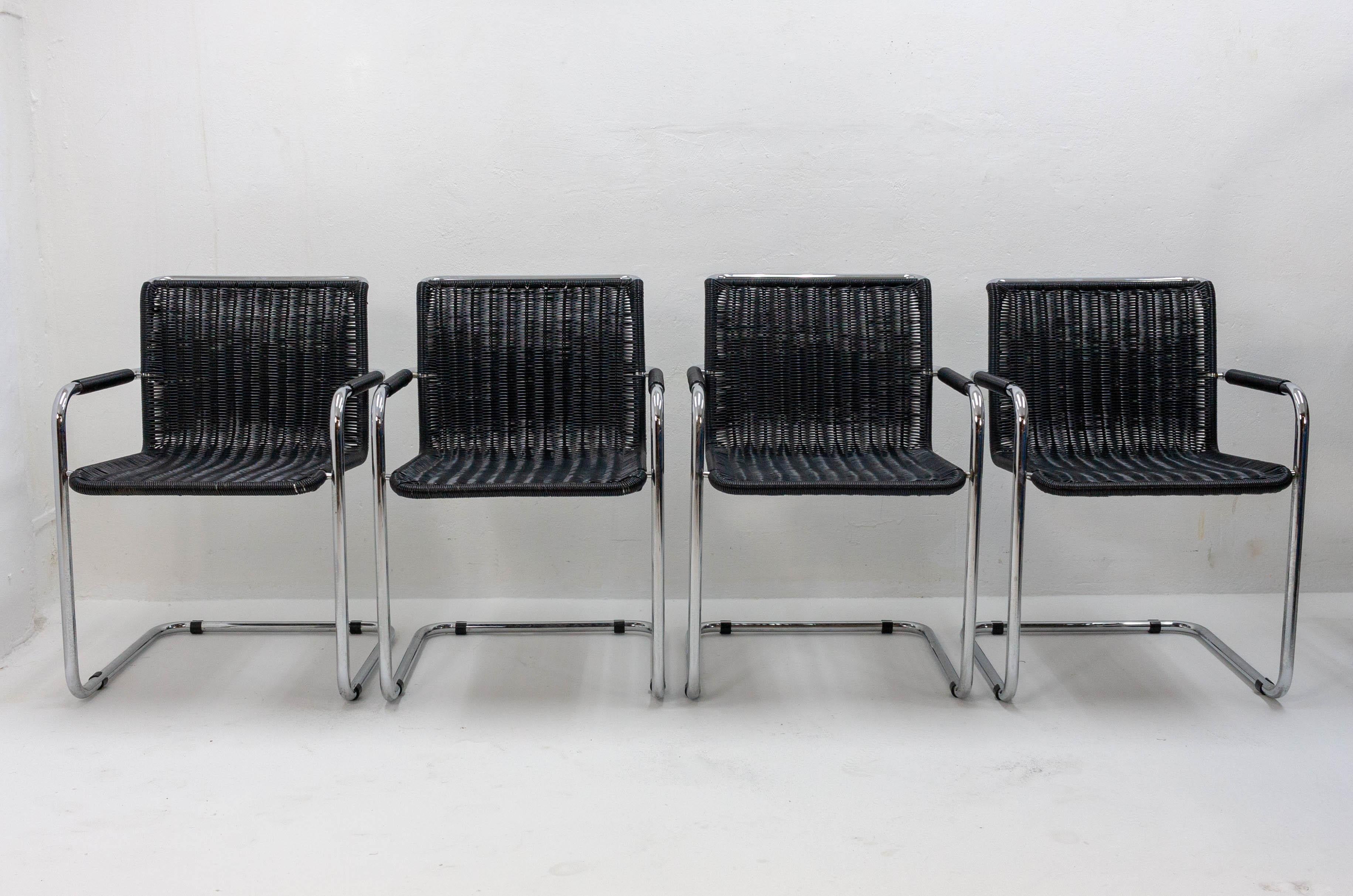 Set of four iconic Mart Stam chairs in heavy chrome with black rattan-weave PVC seats.  Fasem  Made in Italy,  70s 