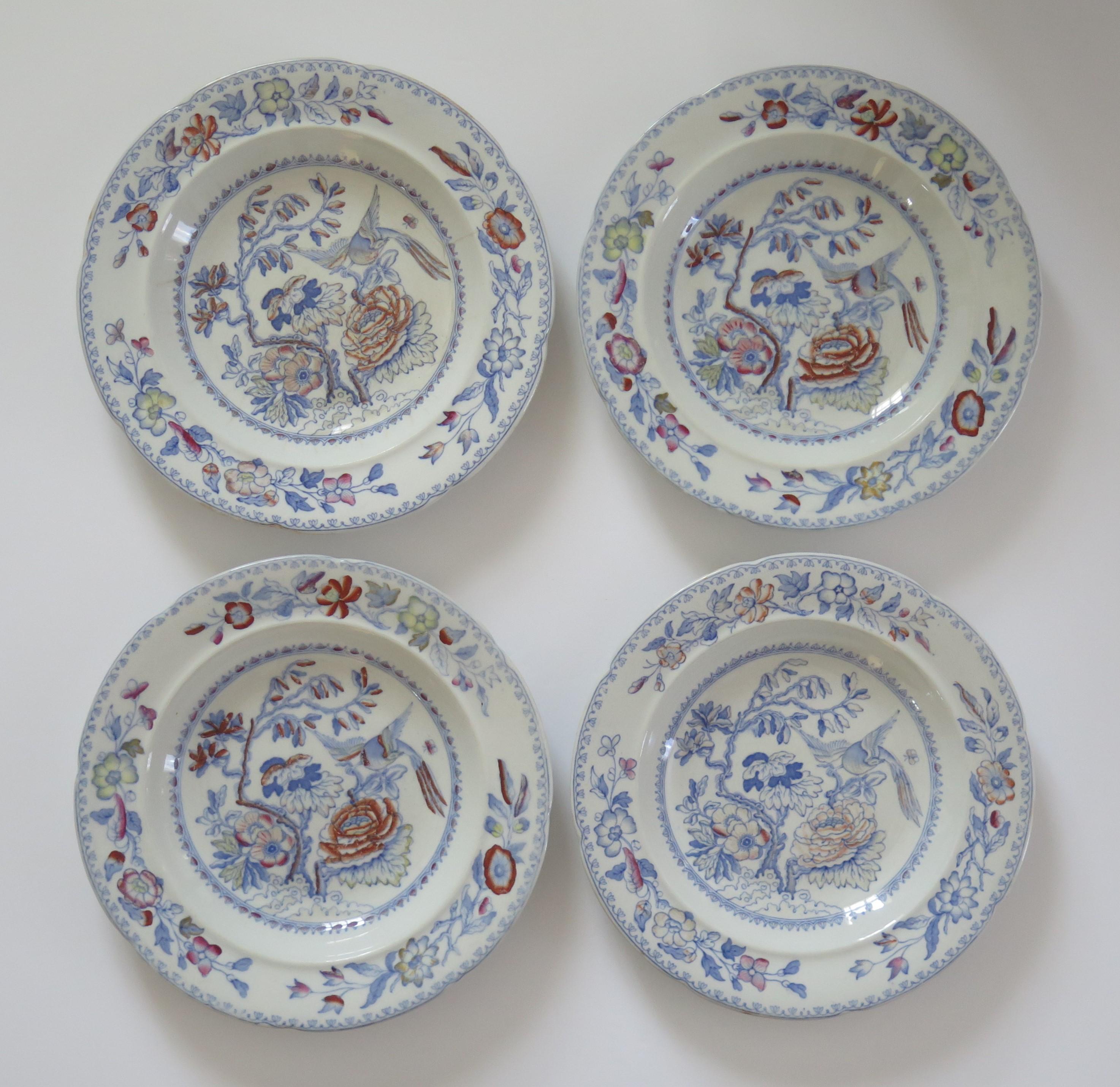 These are a set of FOUR, Ironstone Soup Bowls or Plates in the distinctive flying bird pattern, made by Mason's of Lane Delph, Staffordshire, England, during the mid 19th century, circa 1860.

The Bowls or Plates are well potted with a notched