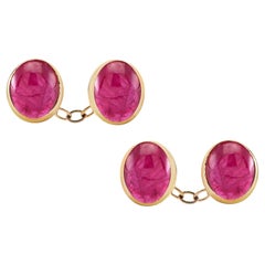 Manschettenknöpfe aus Gelbgold mit passendem Burma-Rubin-Cabochon und doppelseitigen Gliedern