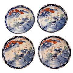 Antique Four Meiji Period Scenic Imari Scalloped Plates, Fukagawa Attributed