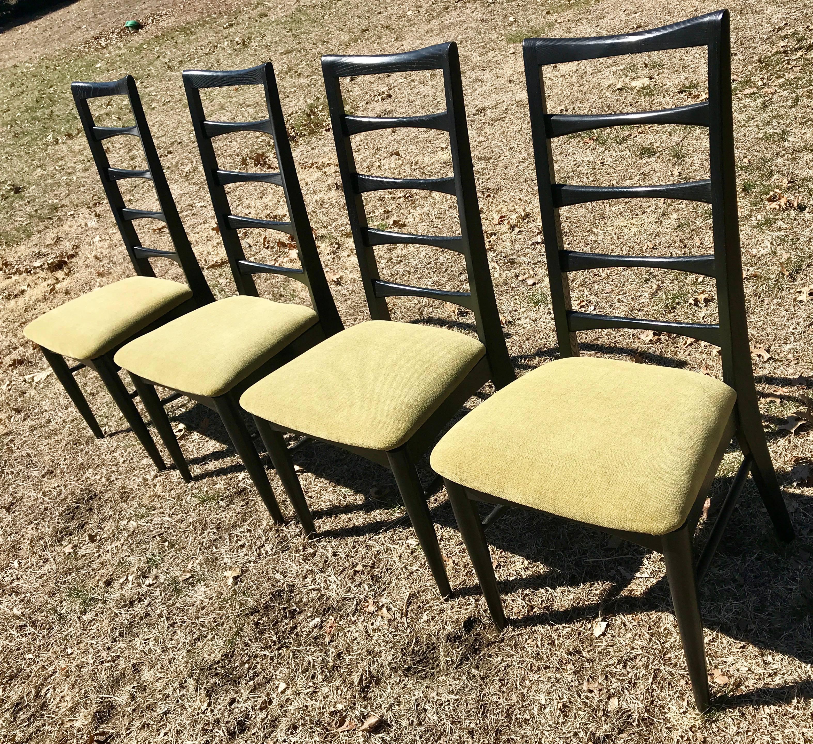 Nice set of four Mid-Century Modern black ladder back dining chairs. Most likely produced in America but very similar to the Danish designed Koefoeds Hornslet chairs, 1960s. Factory sprayed ebony black with fresh new lime green velour fabric.