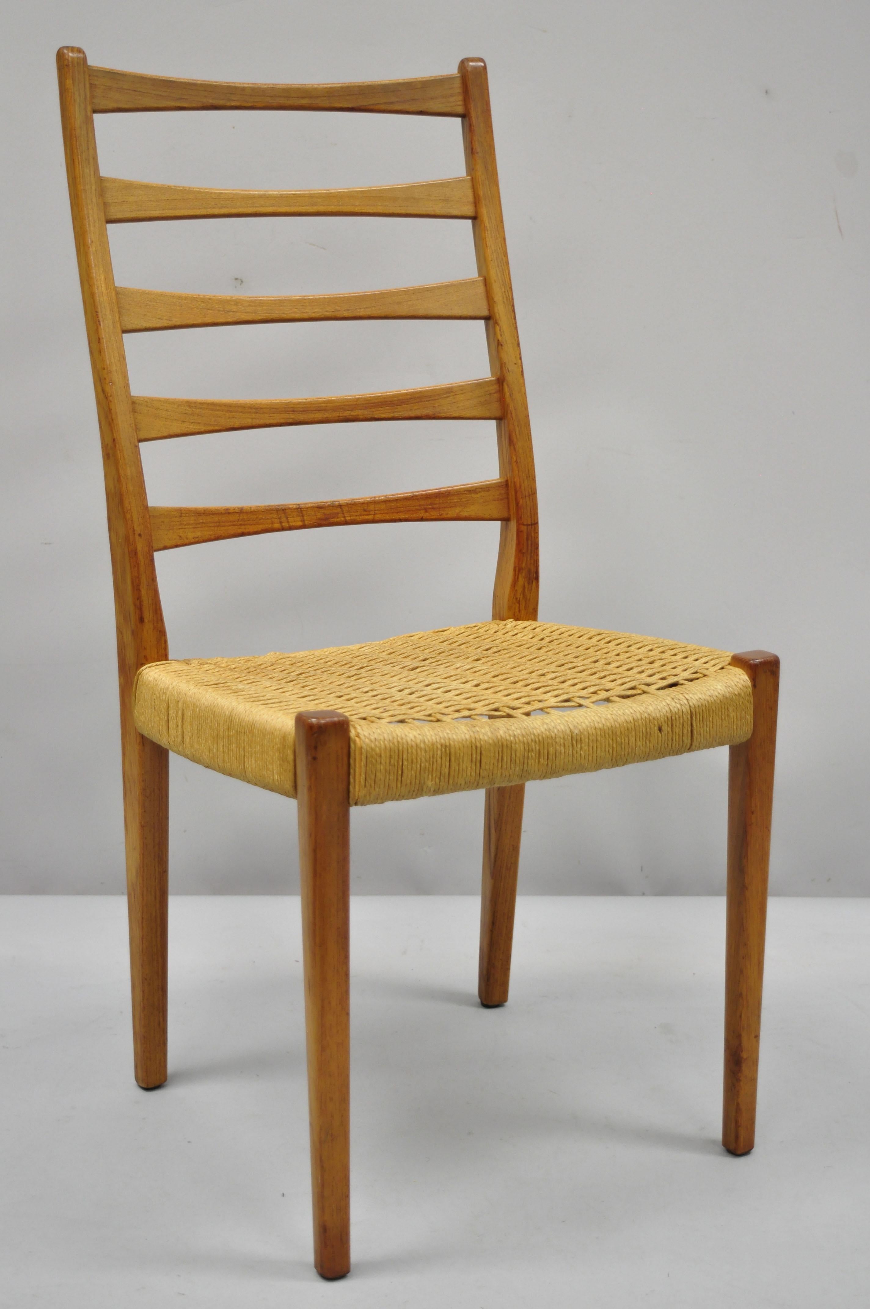 Four vintage midcentury Danish Swedish modern Svegards Markaryd dining chairs. Item features woven rope seat, solid wood frame, beautiful wood grain, original stamp, tapered legs, clean modernist lines, quality craftsmanship, circa mid-20th century.