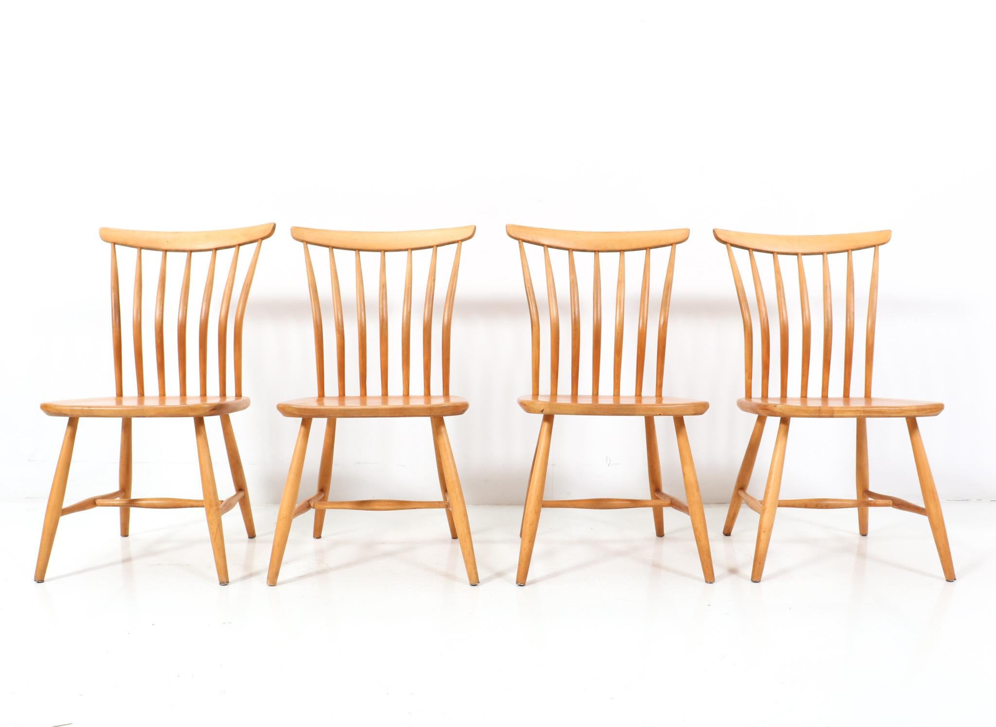 Stunning set of four Mid-Century Modern dining room chairs.
Design by Bengt Akerblom & Gunnar Eklöf for Akerblom Stolen.
Striking Swedish design from the 1950s.
Solid birch frames and all four chairs are marked with the original manufacturers