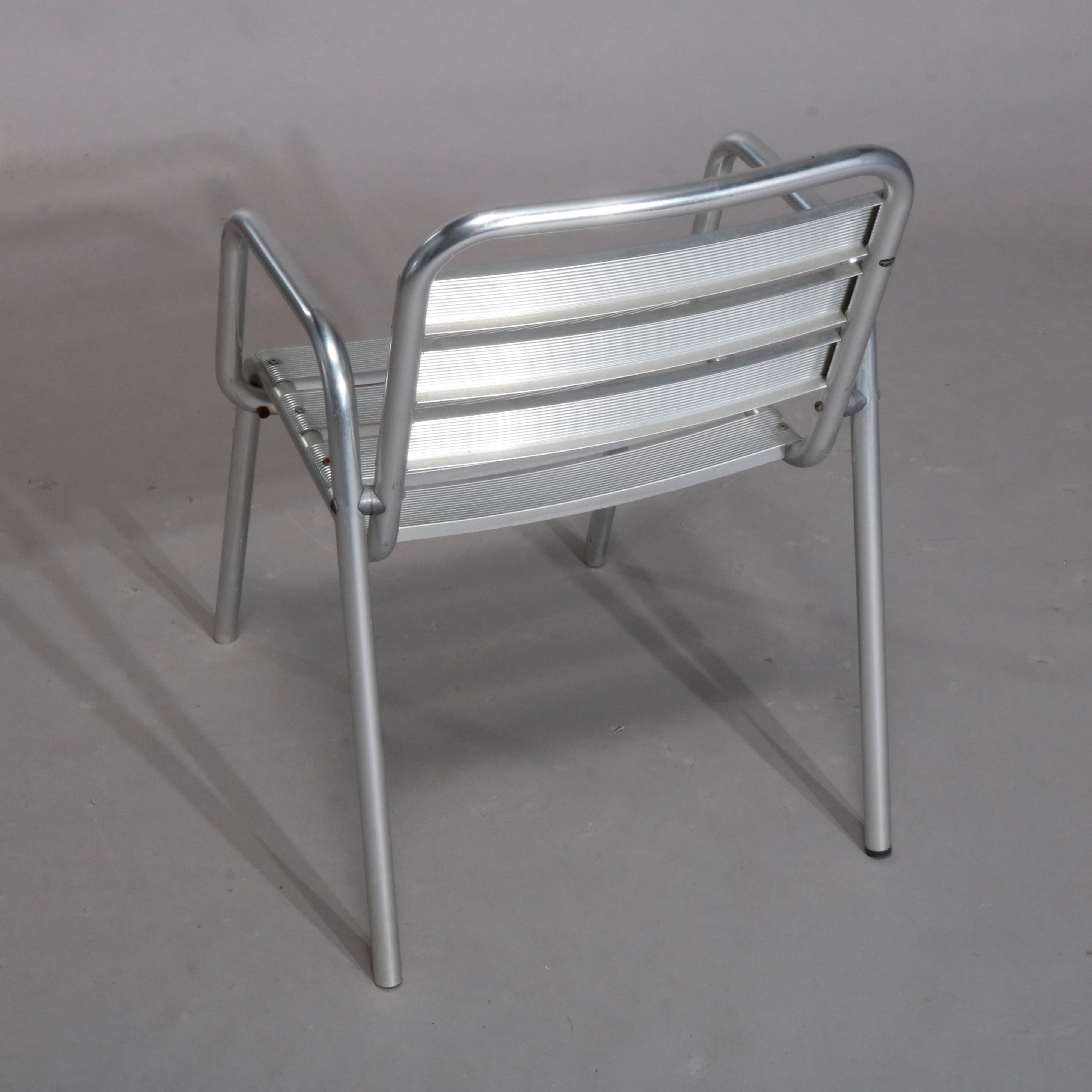 20th Century Four Mid-Century Modern Stacking Aluminum Banded Armchairs, circa 1960