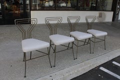 Four Mid Century Patio Chairs
