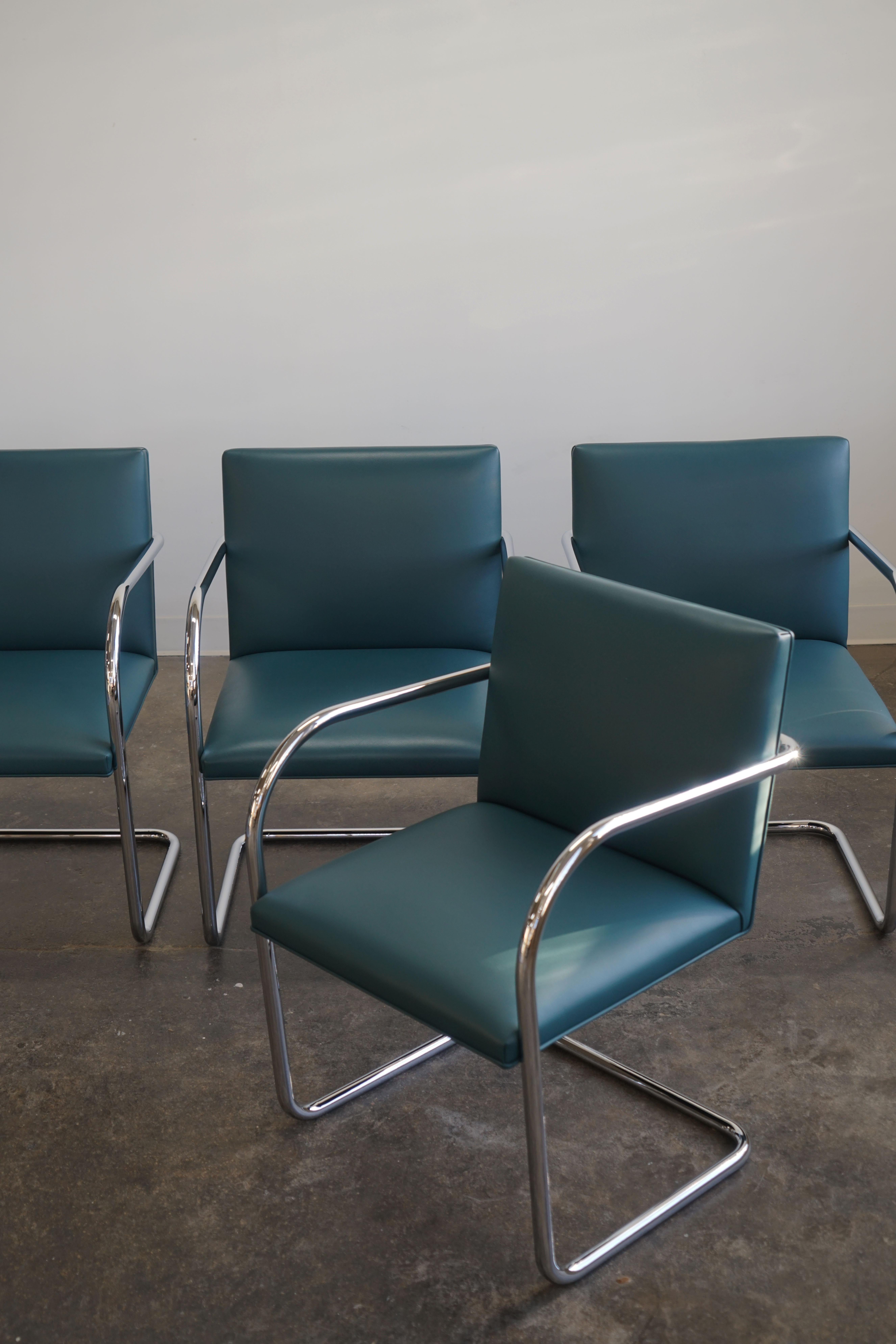 Set of Four Mies van der Rohe for Knoll BRNO tubular chairs
In teal leather.

The elegant Brno Tubular Chair (designed in 1930) has a chromed tubular steel frame that fluidly bends into a curving single-piece form. This is one  the first