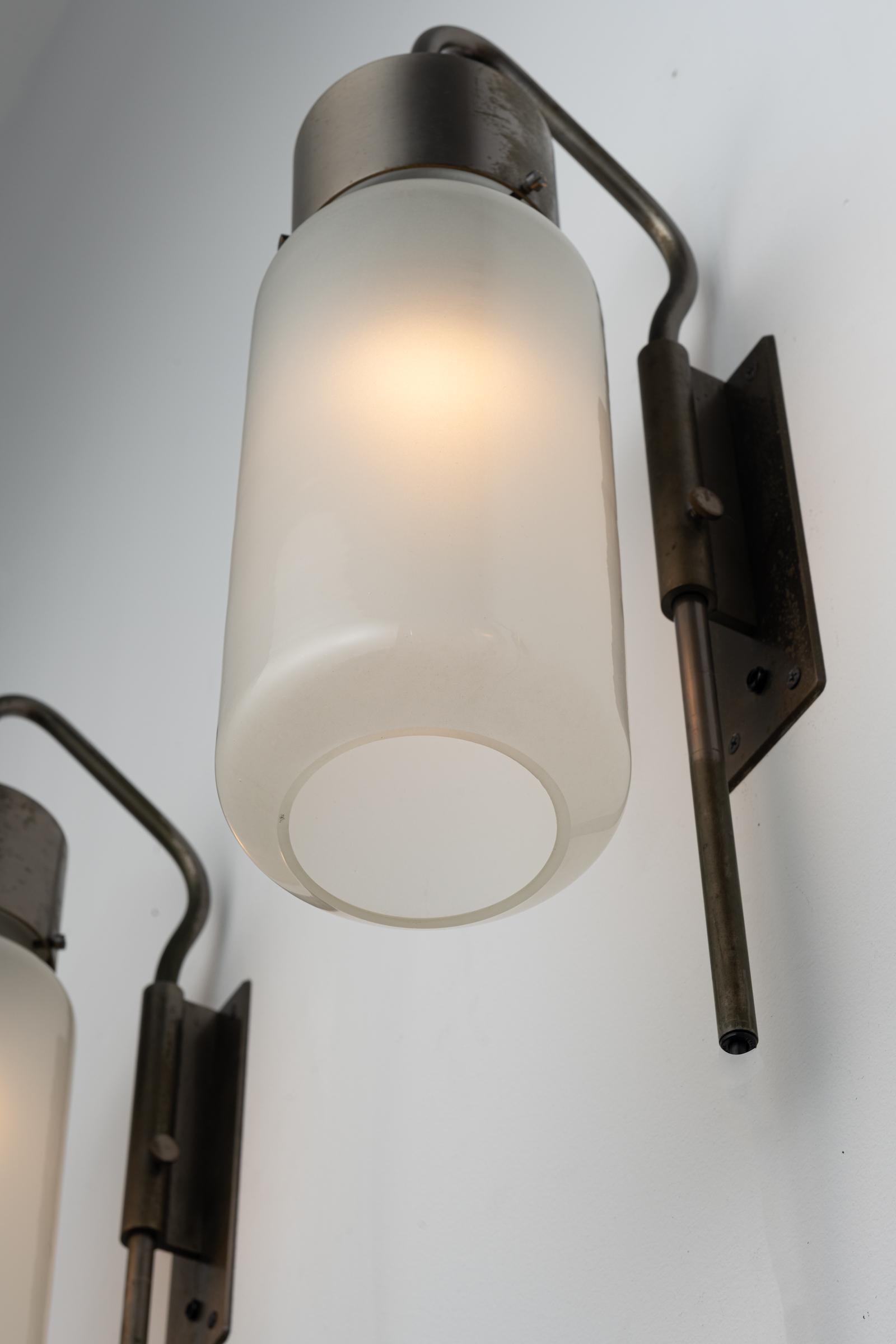 Patinated Single Model Lp10 Bidone Wall Light by Luigi Caccia Dominioni for Azucena For Sale