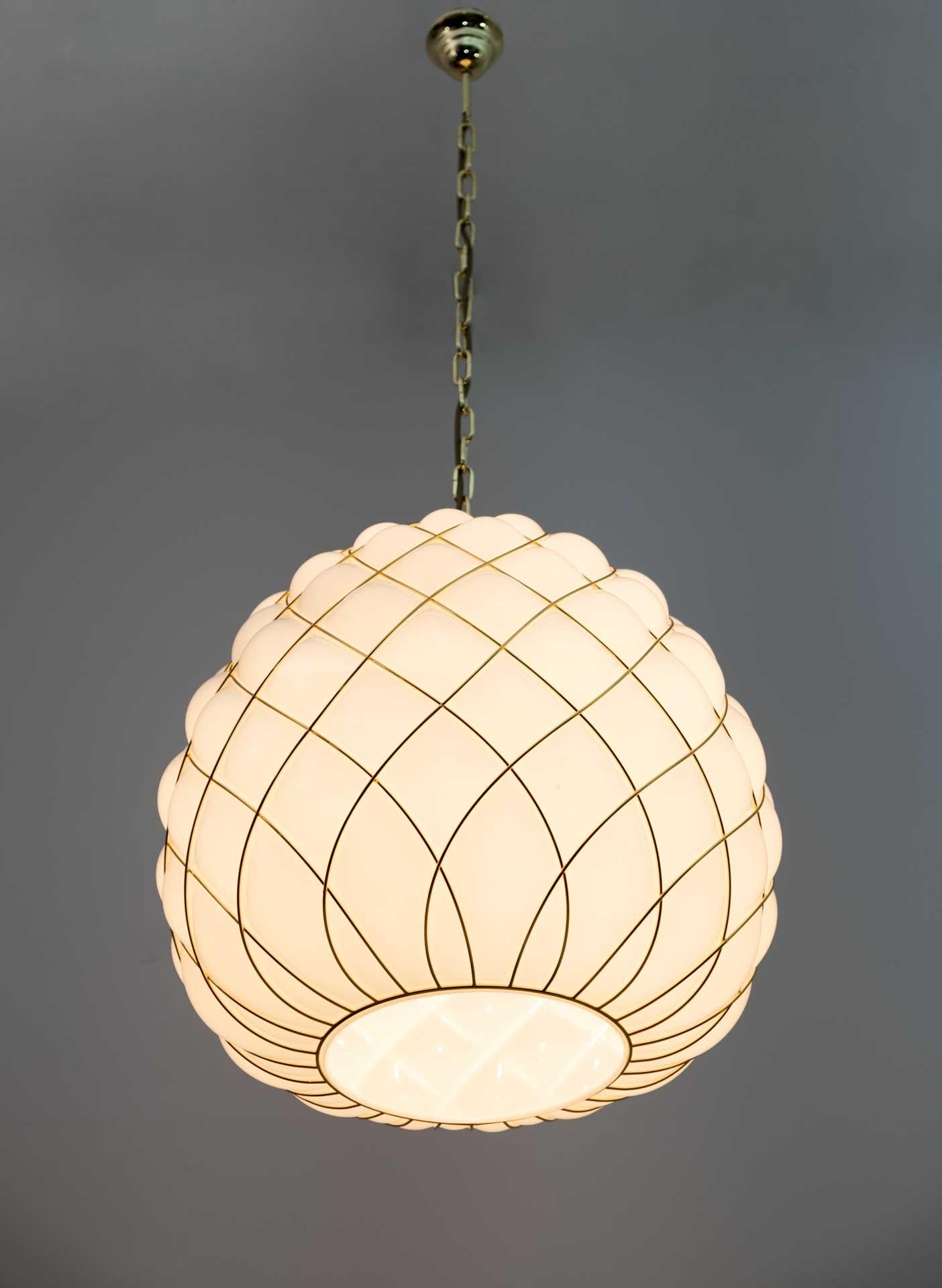 Mid-Century Modern Four Modern Brass and Caged Murano Glass Large Pendant Lamps by Fontana Arte For Sale
