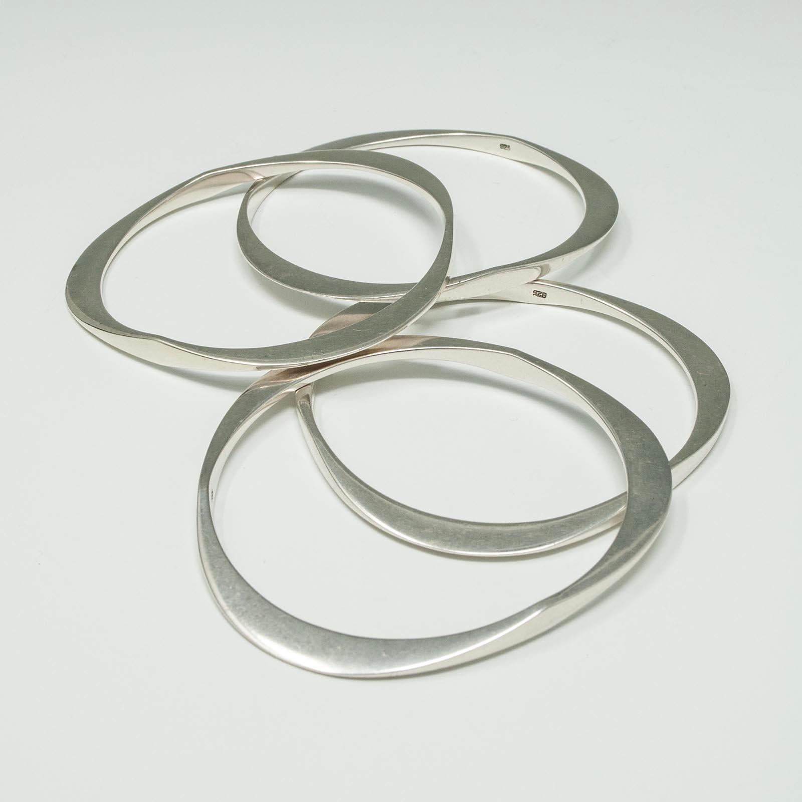 Women's or Men's Four Modern Silver Triangular Bangle Bracelets For Sale