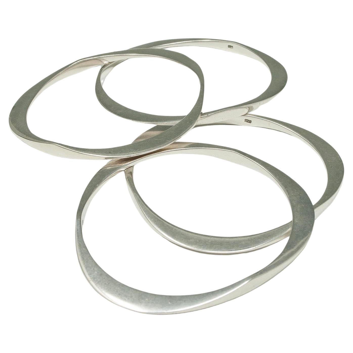 Four Modern Silver Triangular Bangle Bracelets