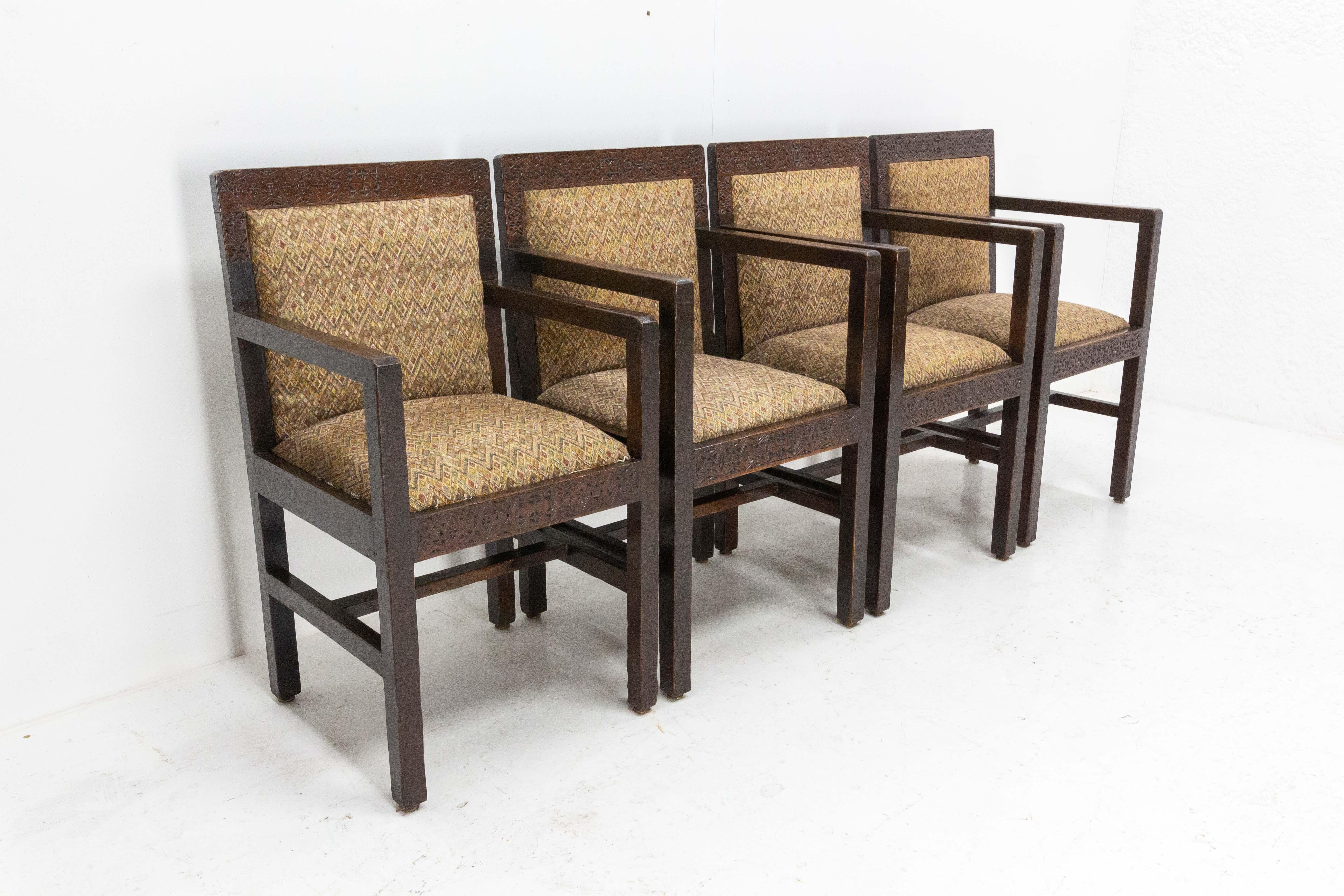 Pair of Moroccan Art Deco armchairs, circa 1930
One of the fauteuils has the particularity of having armrests lower than the others.
Original antique condition 
Frames are sound and solid, upholstery has to be changed.

Shipping:
L119 P55 H123