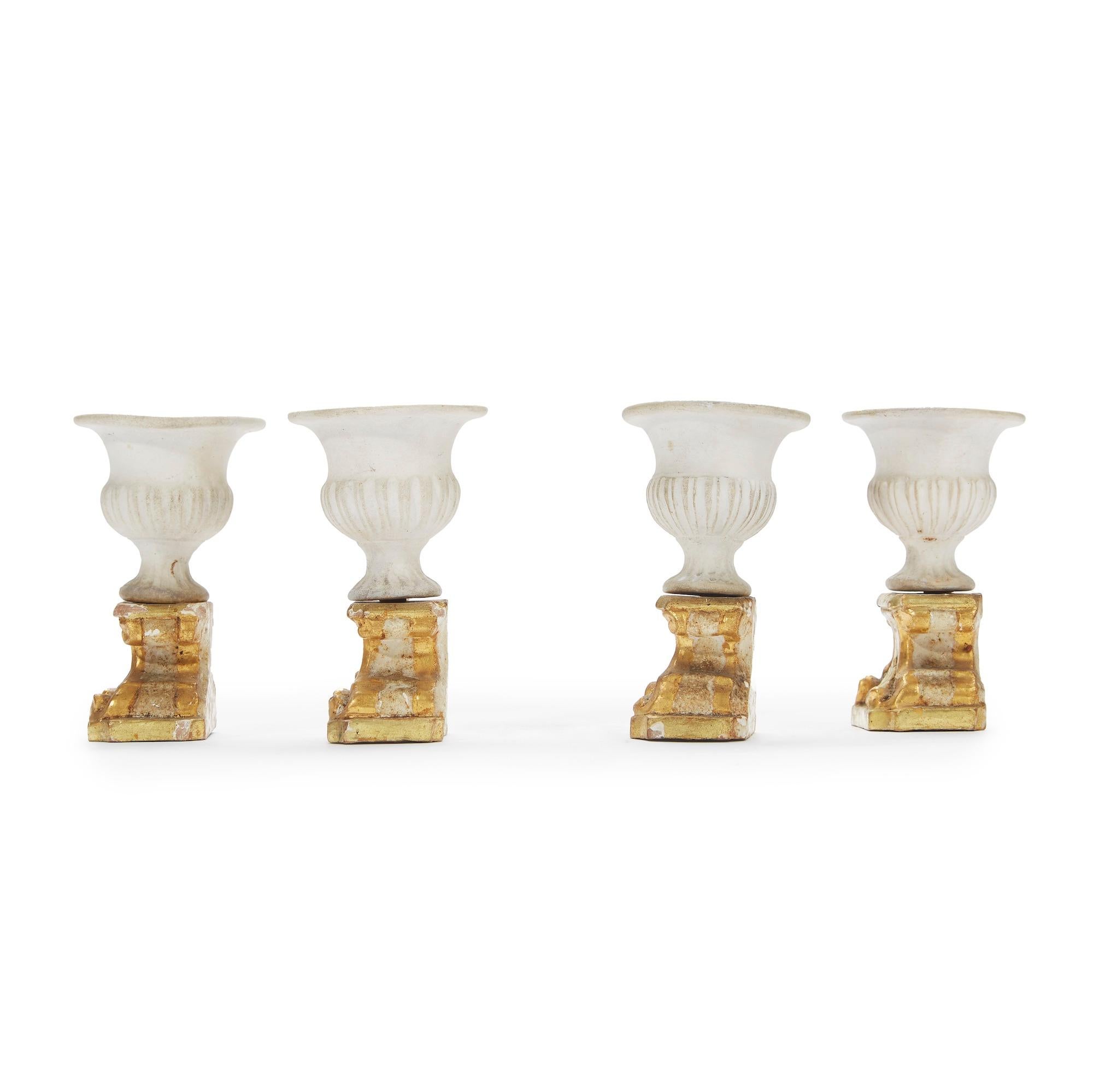 Hand-Carved Four Neoclassical Italian Biscuit Vases on Giltwood Bases Table Decorations For Sale