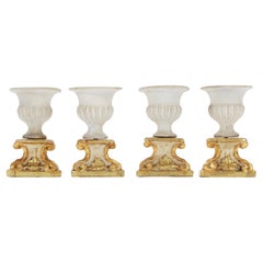 Four Neoclassical Italian Biscuit Vases on Giltwood Bases Table Decorations