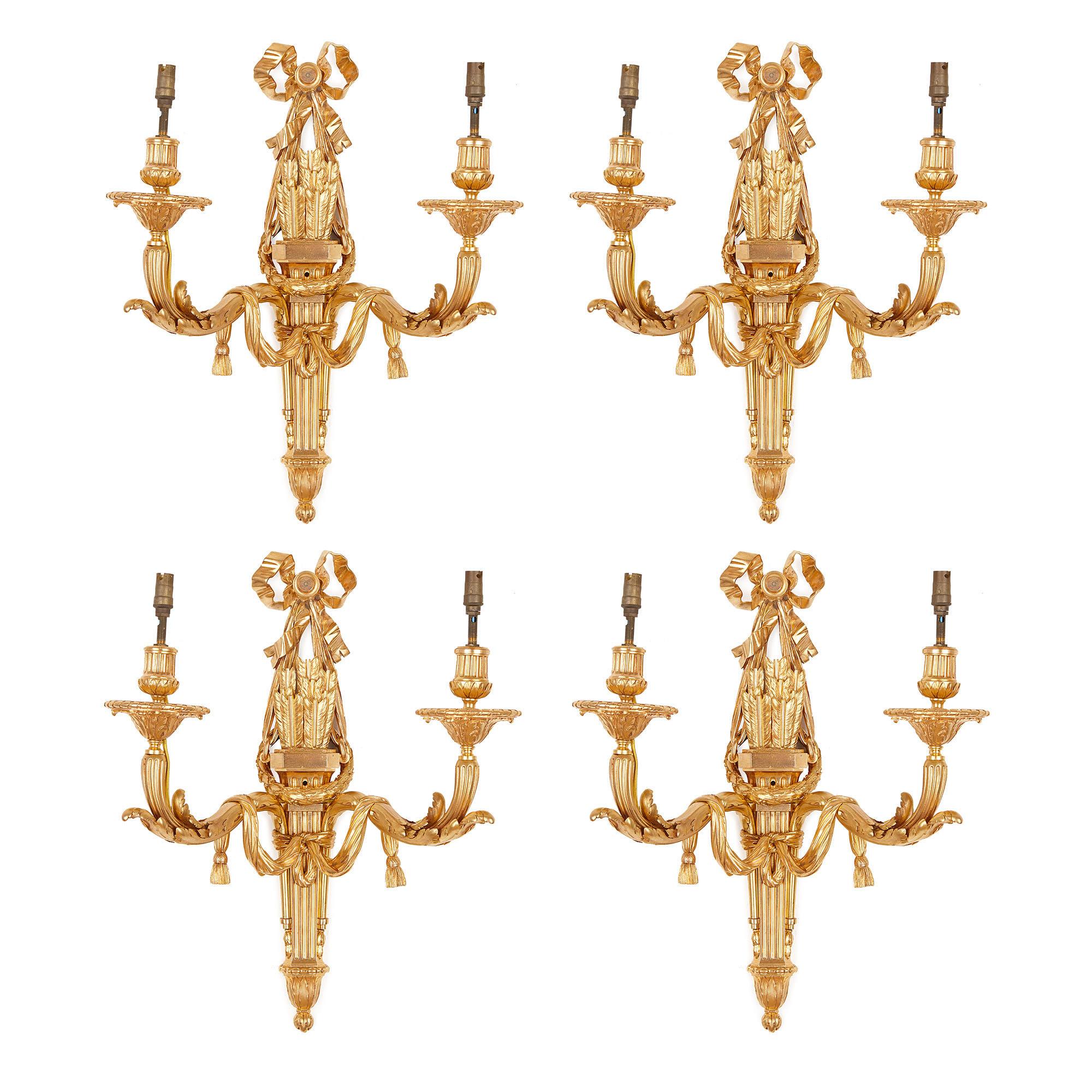 Four Neoclassical Style Gilt Bronze Two-Light Sconces