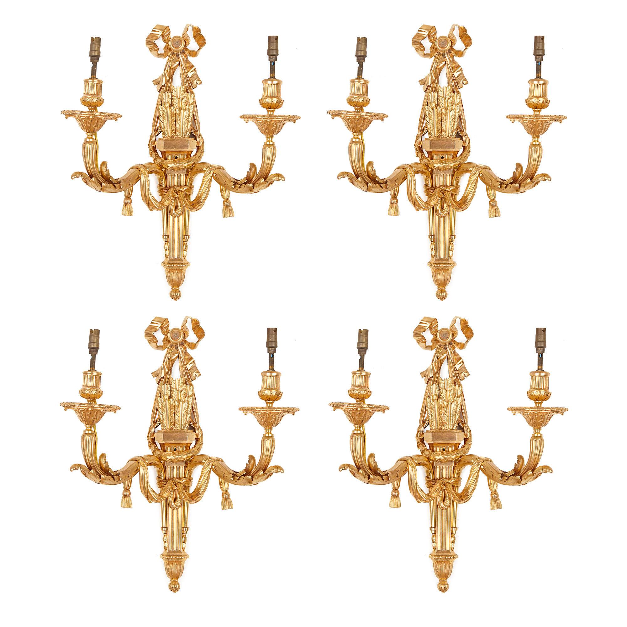 Four Neoclassical Style Gilt Bronze Two-Light Sconces For Sale