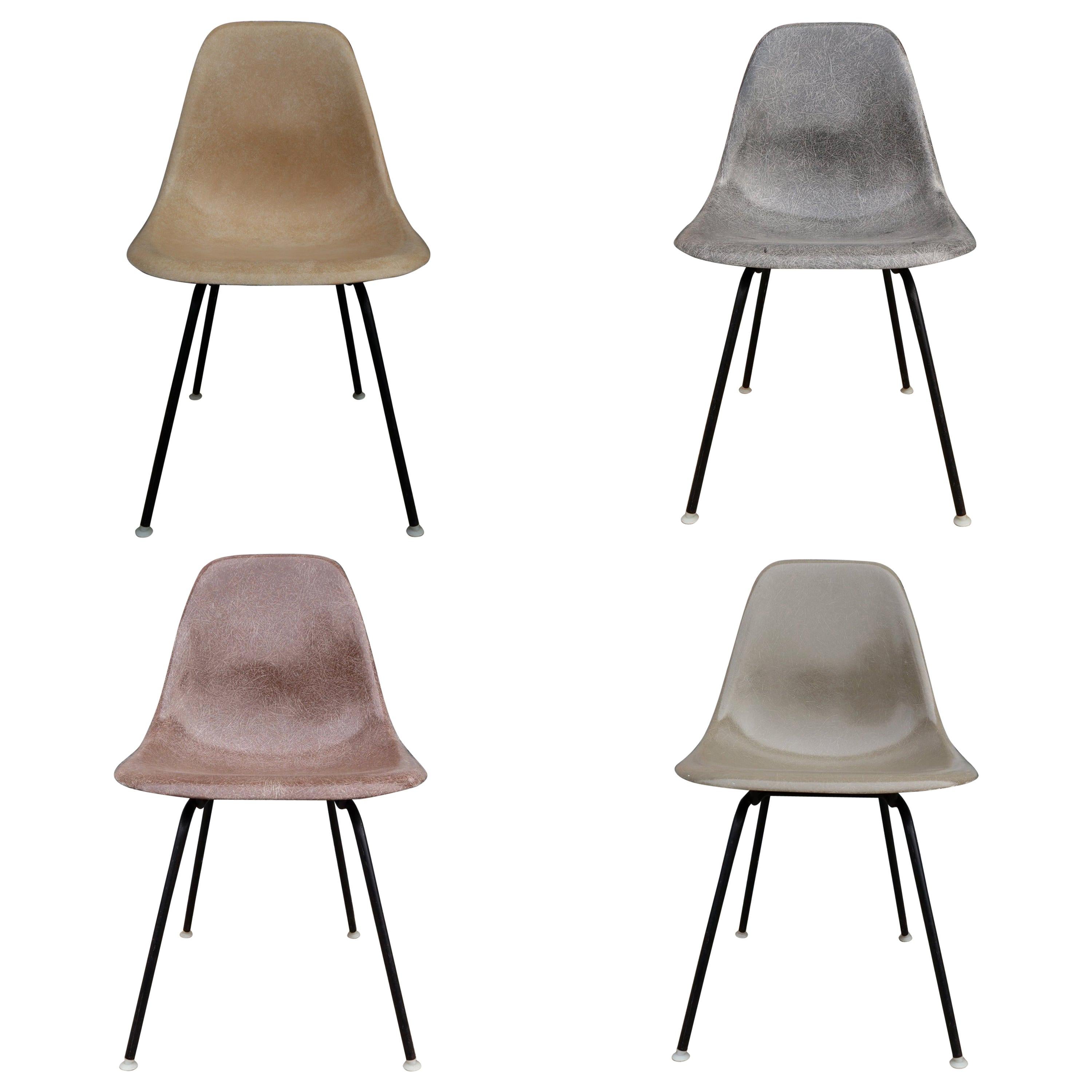 Four Neutral Herman Miller Eames Dining Chairs