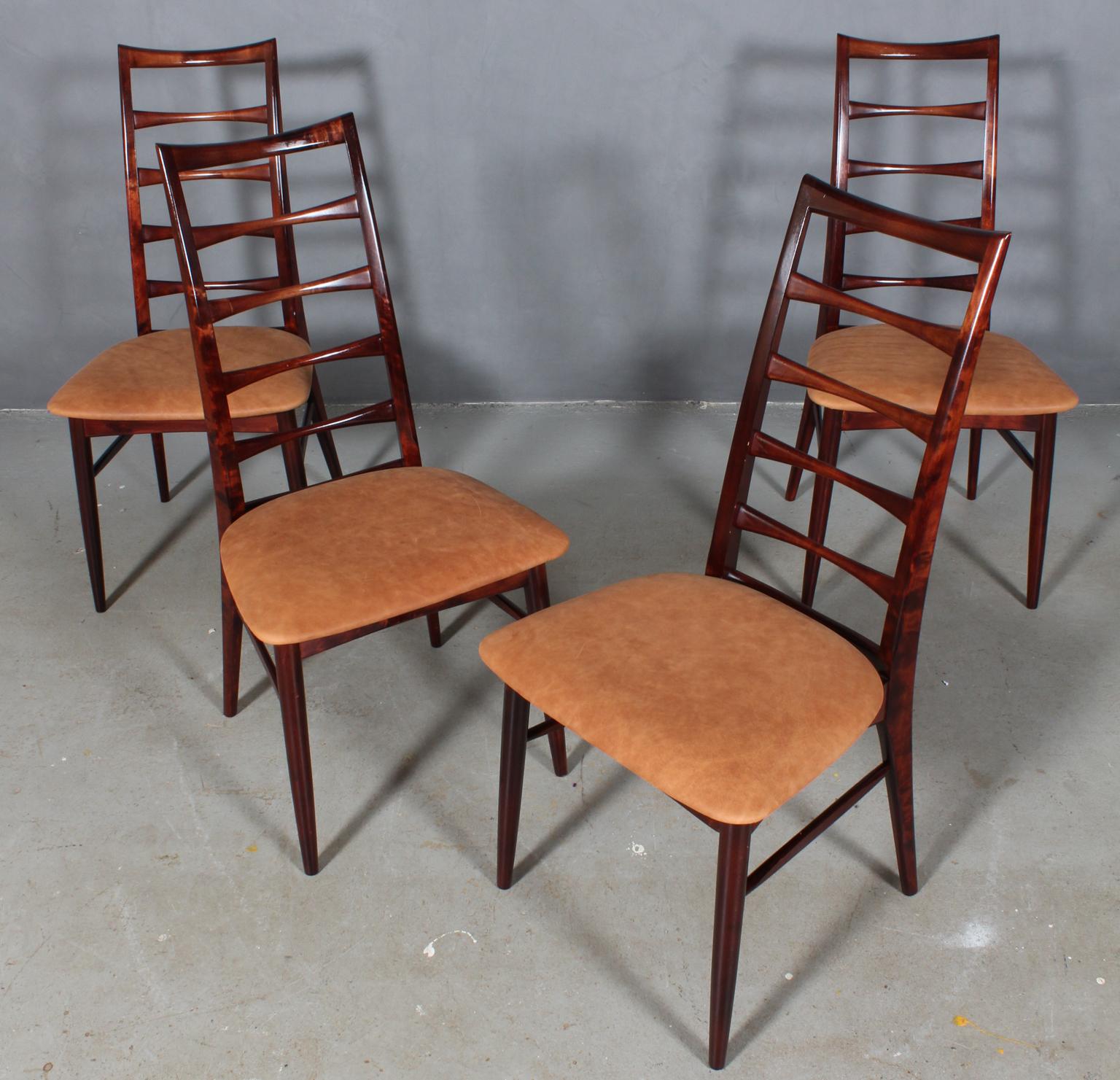 Set of four Niels Koefoed dining chairs made in solid mahogany.

New upholstered in cognac Dunes aniline leather from Arne Sørensen.

Model Lis, made by Niels Koefoeds Møbelfabrik Hornslet, 1960s.