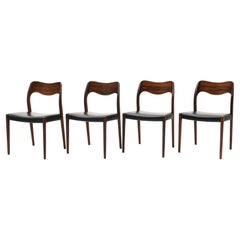Four Niels Moller Model 71 Dining Chairs in Rosewood and Black Leather.
