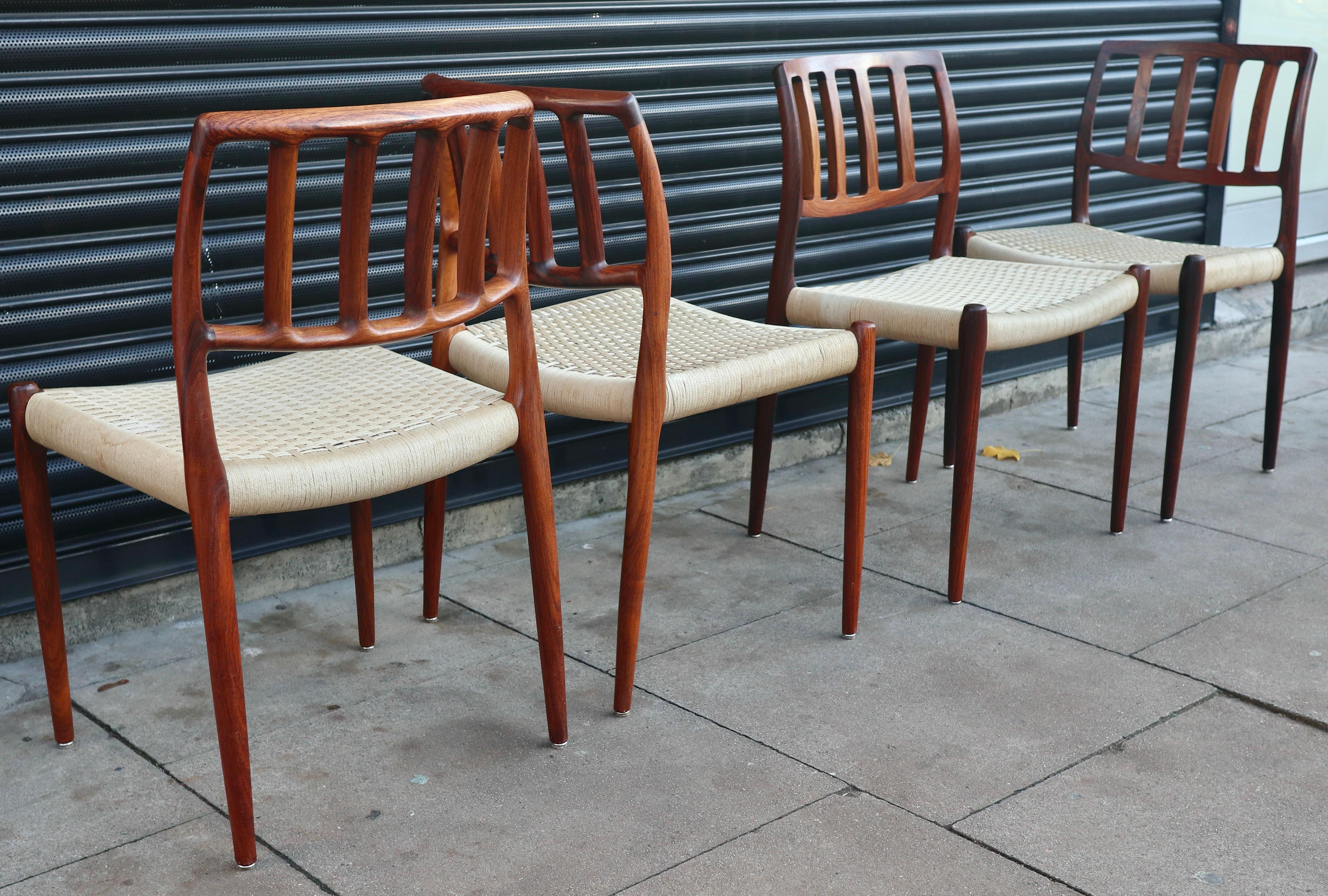 Four Niels.O Moller 83 Rosewood Dining Chairs by J.L. Mollers with woven Seats For Sale 6