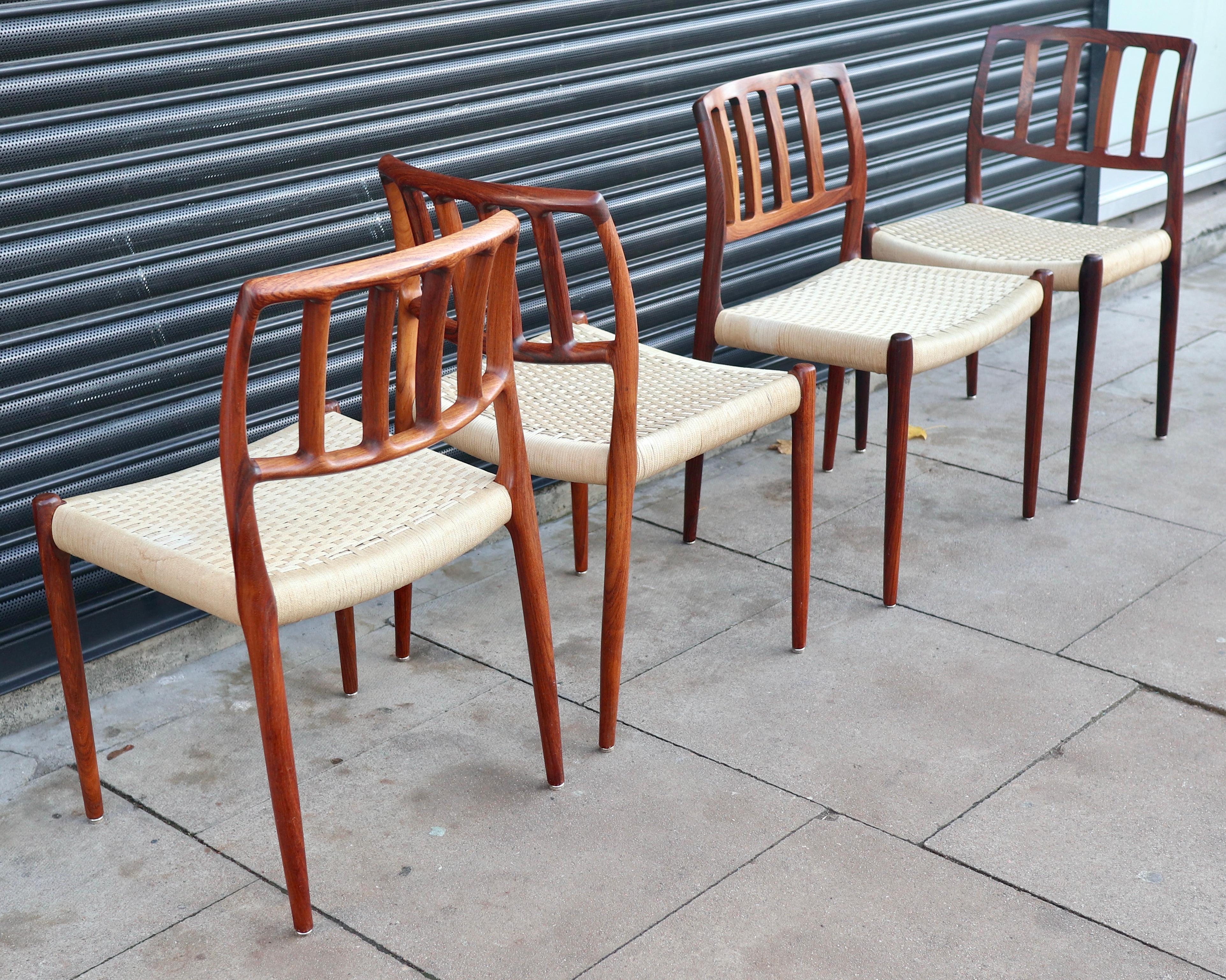 Four Niels.O Moller 83 Rosewood Dining Chairs by J.L. Mollers with woven Seats For Sale 8