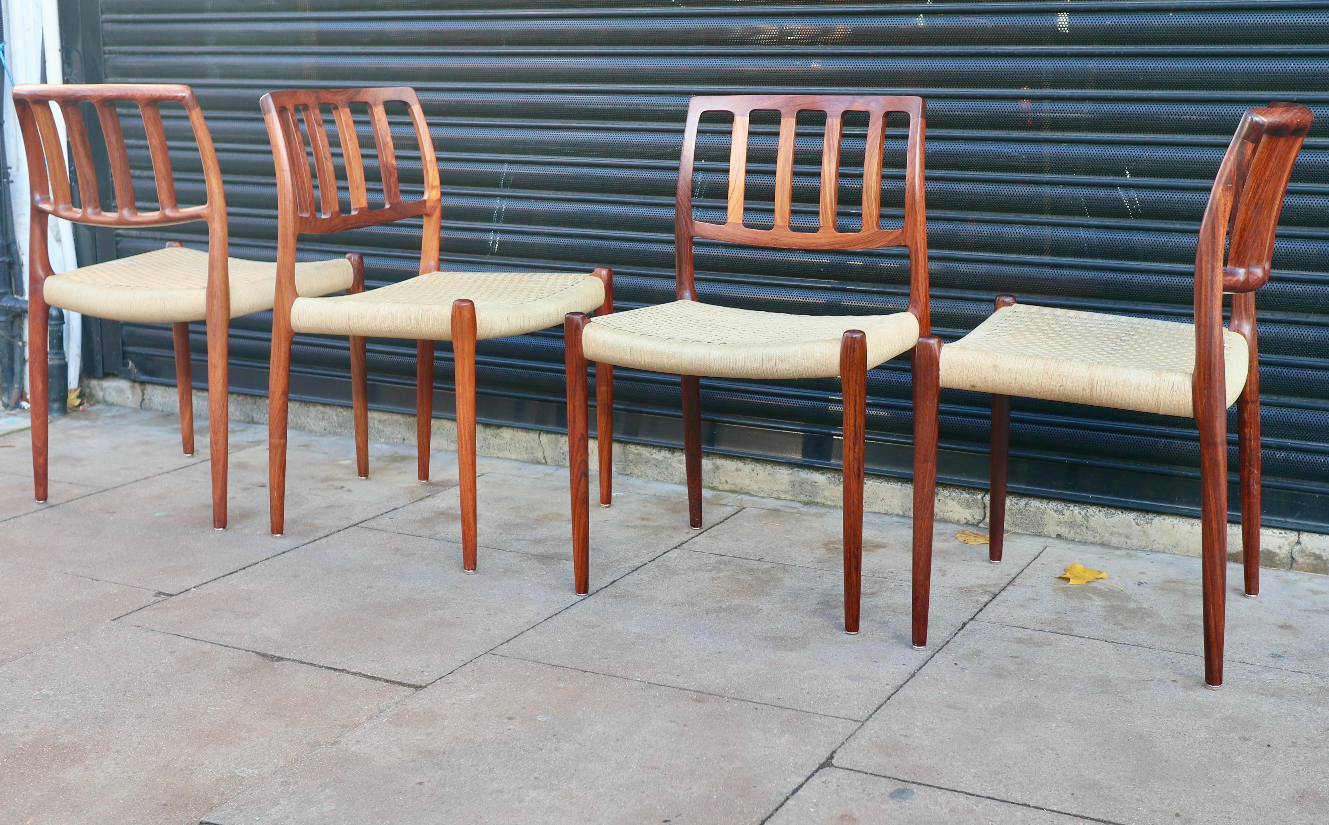 Four Niels.O Moller 83 Rosewood Dining Chairs by J.L. Mollers with woven Seats For Sale 11