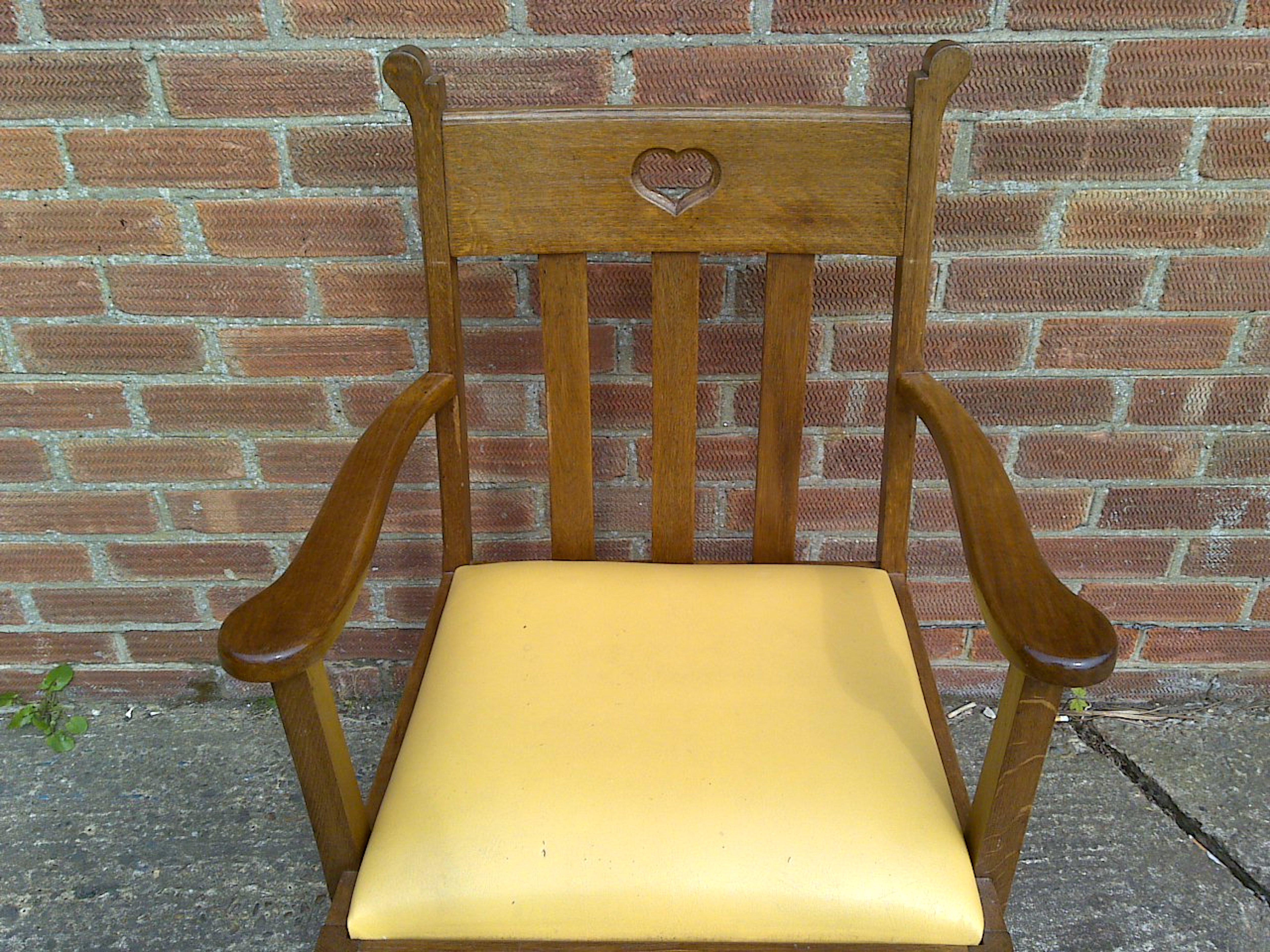 Pair Oak Armchairs, in the style of Liberty & Co with heart Cut-Out to the backs For Sale 1