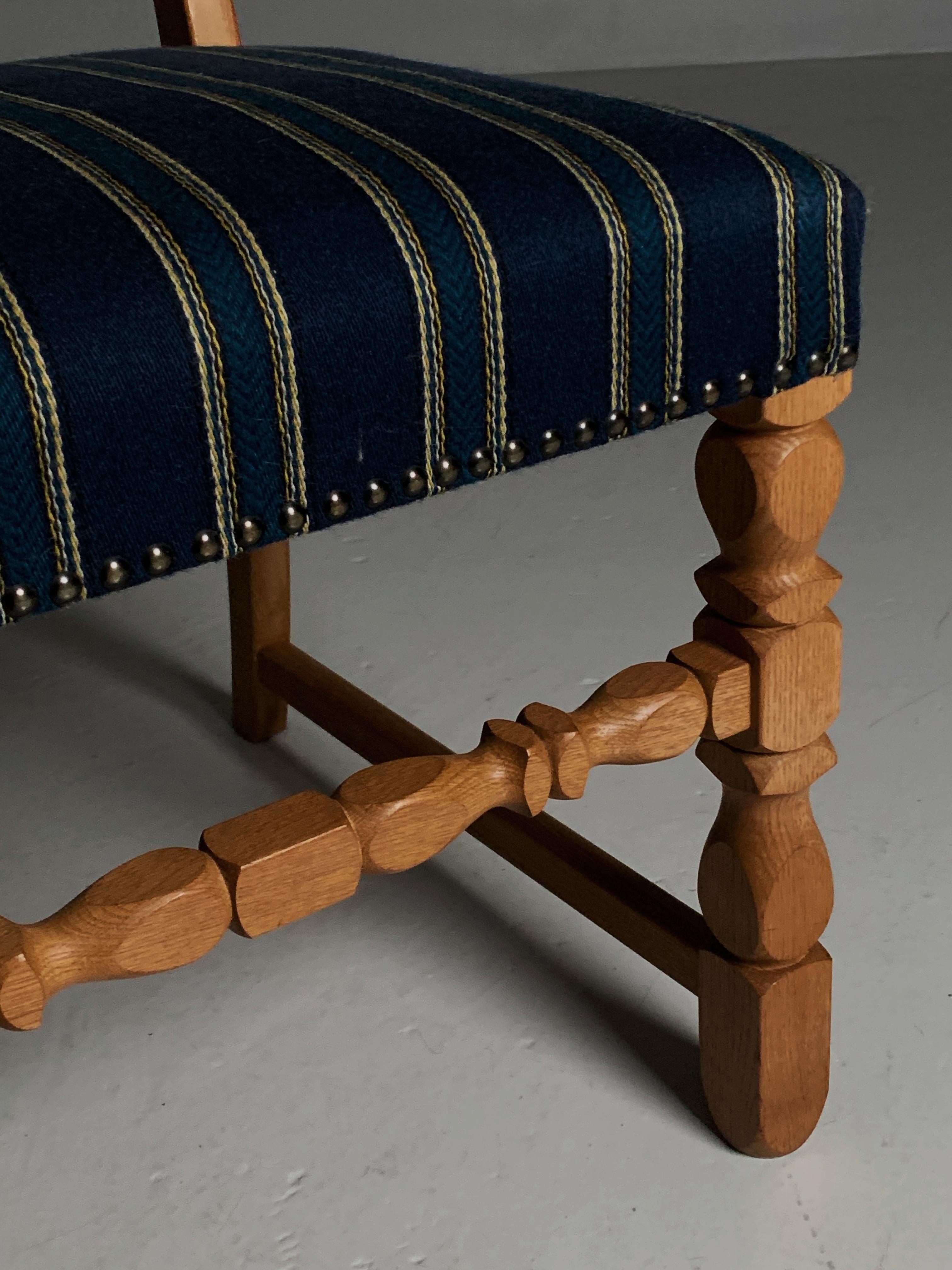Four oak dining chairs in the style of Henning Kjærnulf, Denmark, 1960s For Sale 1