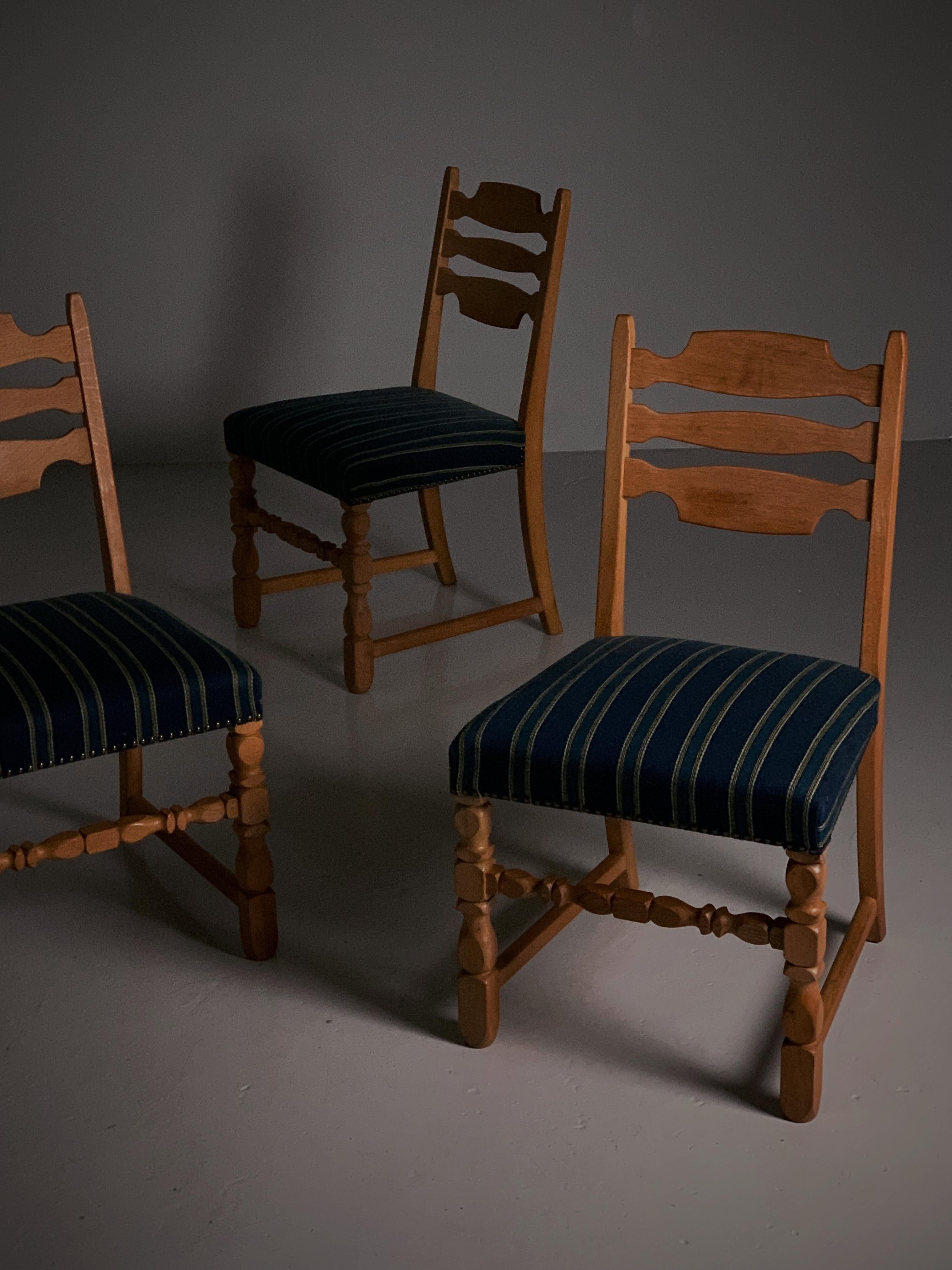 Four oak dining chairs in the style of Henning Kjærnulf, Denmark, 1960s For Sale 2